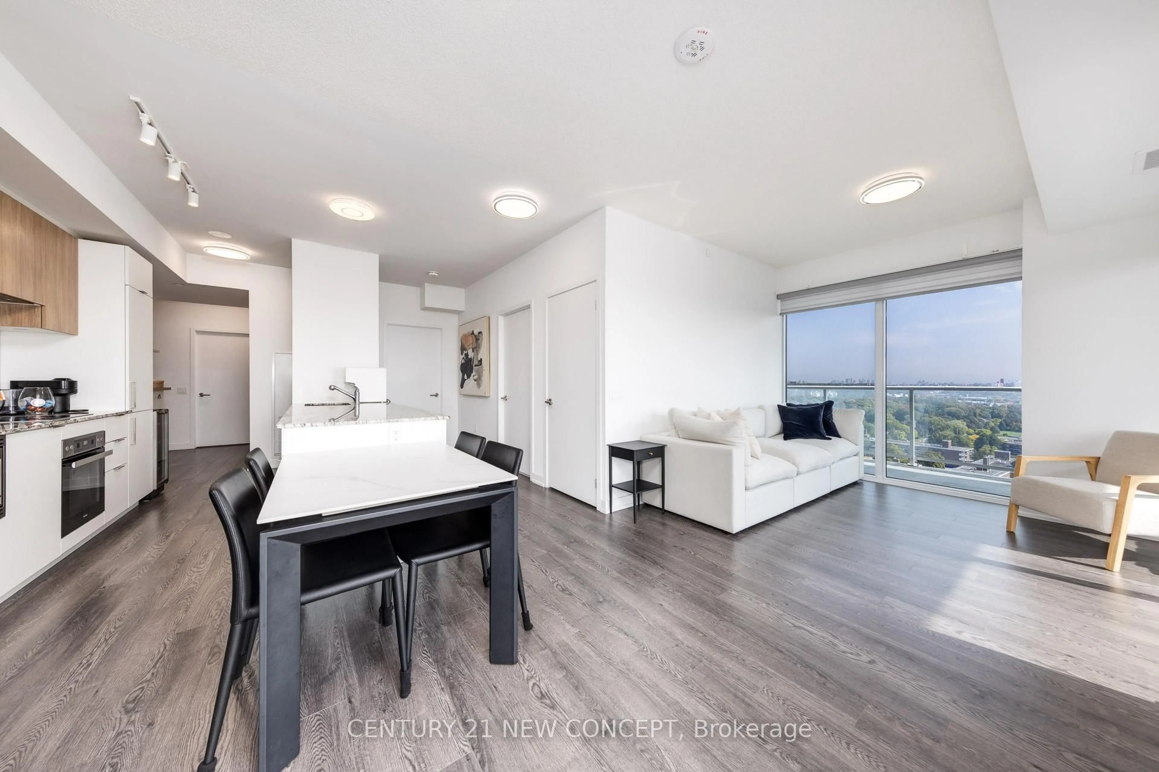 Open concept kitchen, wood/laminate floor for 20 O'neill Rd #1414, Toronto Ontario M3C 0R2