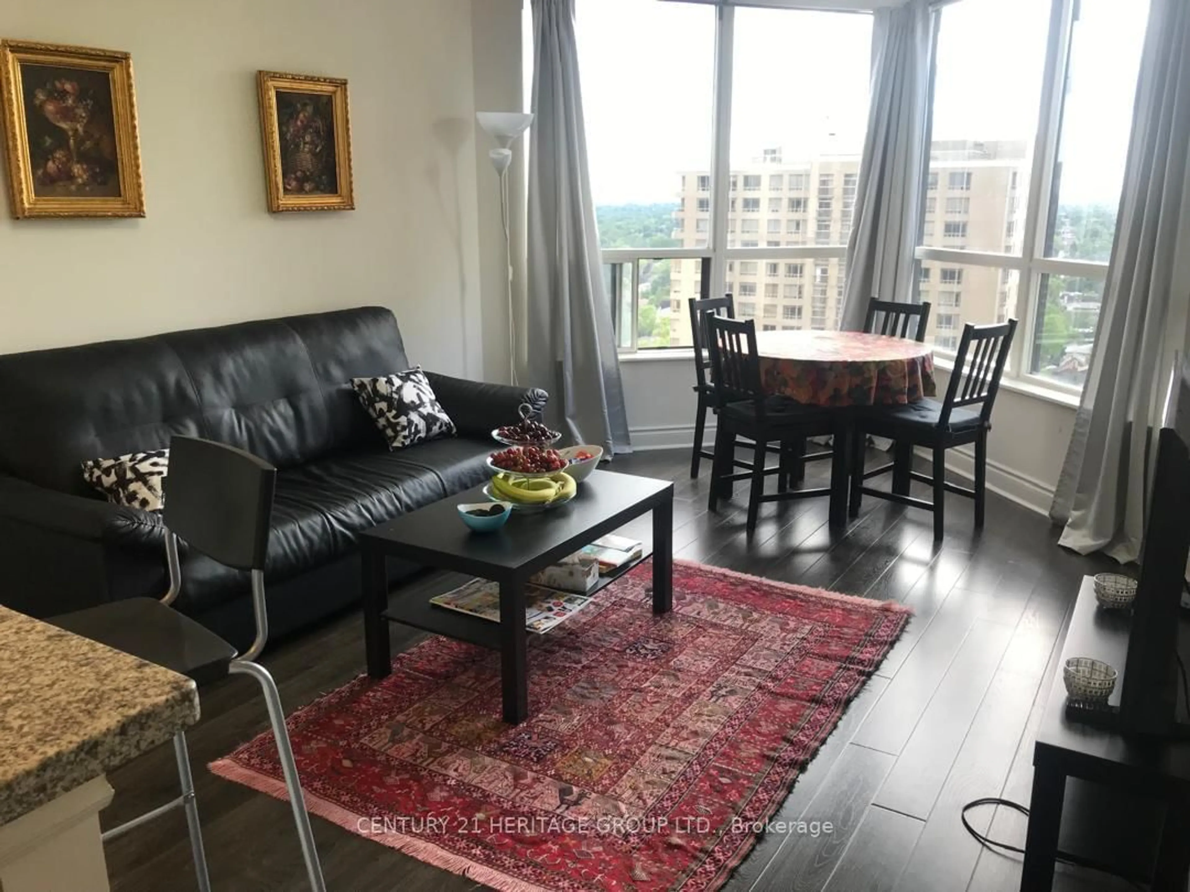 Living room with furniture, wood/laminate floor for 10 Northtown Way #2009, Toronto Ontario M2N 7L4