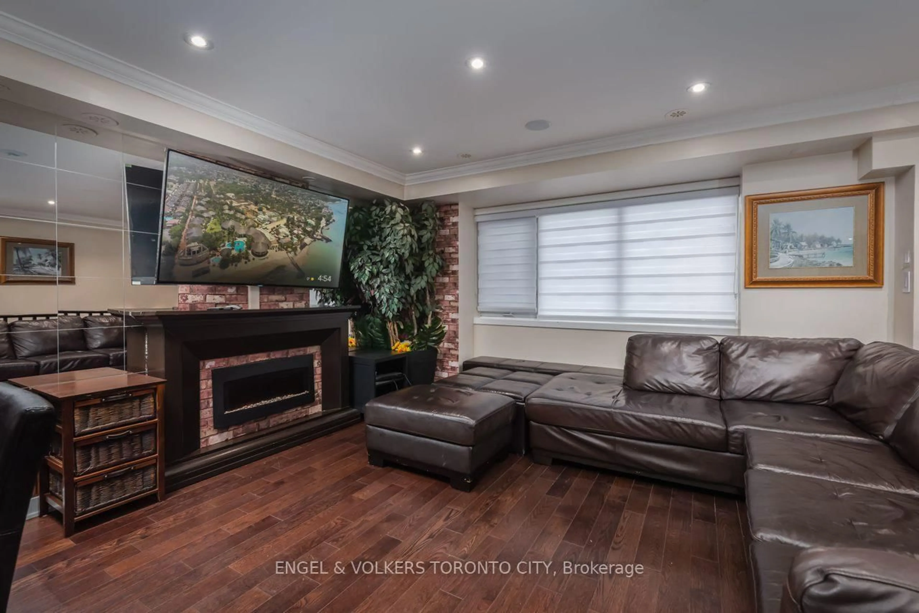 Living room with furniture, wood/laminate floor for 50 Cole St, Toronto Ontario M5A 0A3