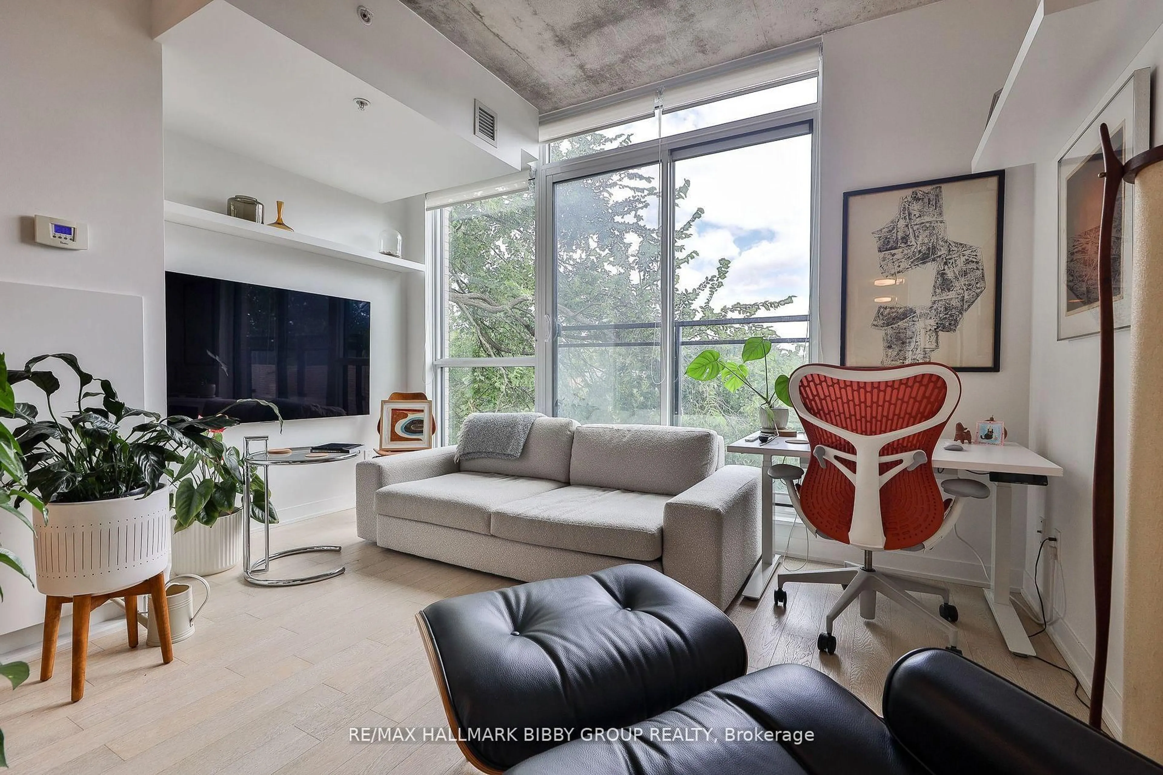 Living room with furniture, unknown for 130 Rusholme Rd #309, Toronto Ontario M6H 1A7