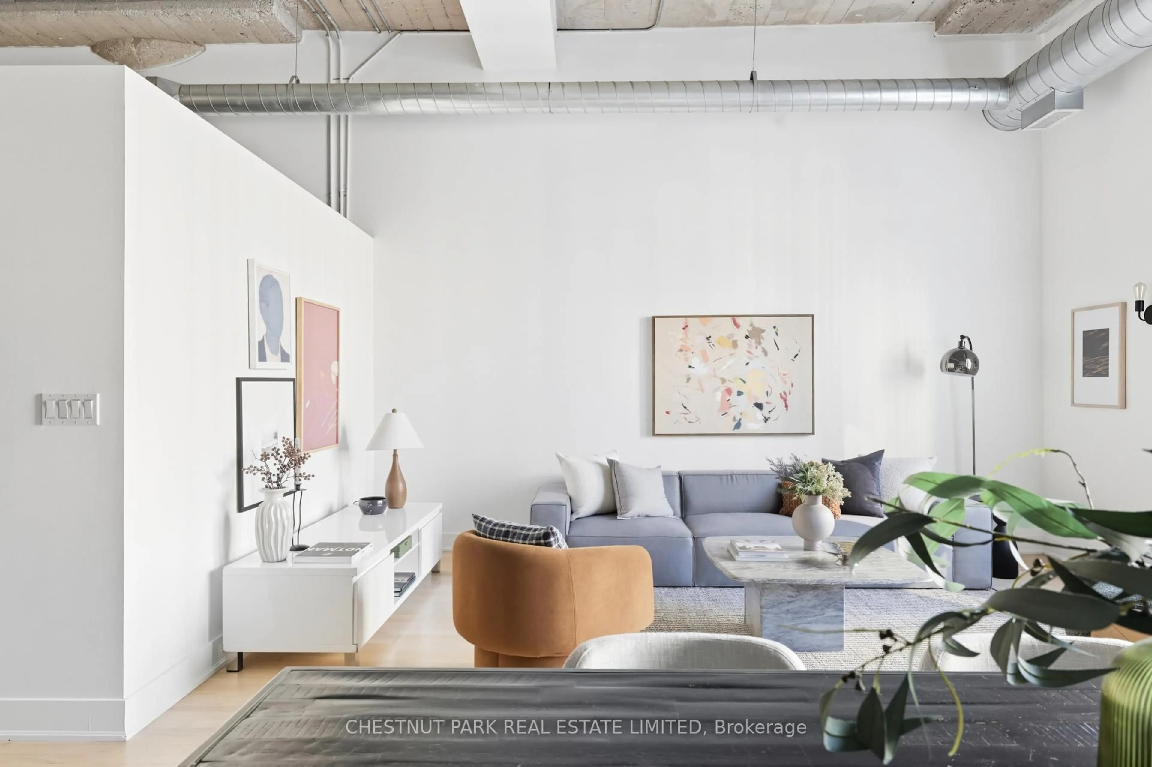 Living room with furniture, cement floor for 637 Lakeshore Blvd #215, Toronto Ontario M5V 3J6