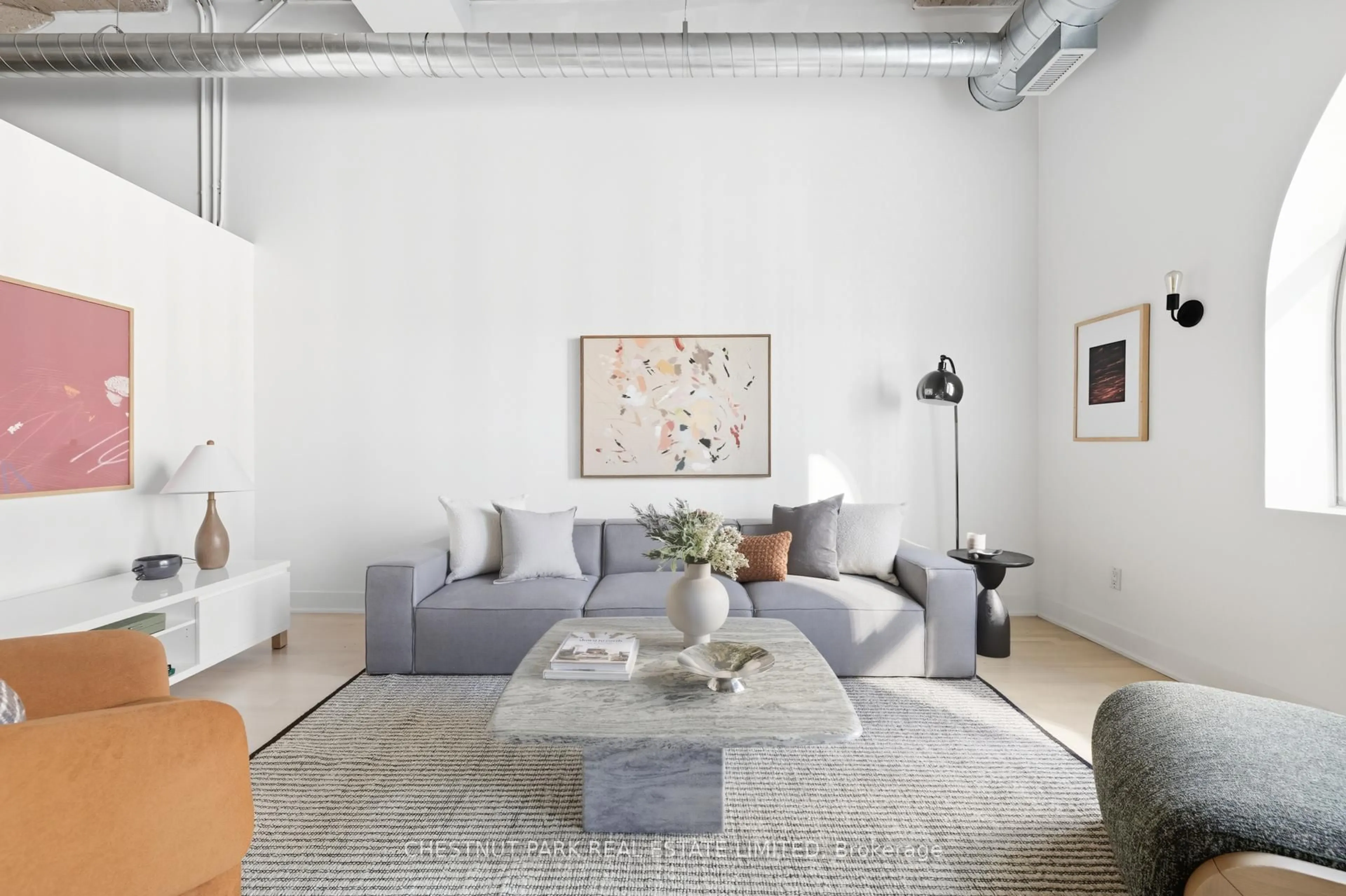 Living room with furniture, cement floor for 637 Lakeshore Blvd #215, Toronto Ontario M5V 3J6