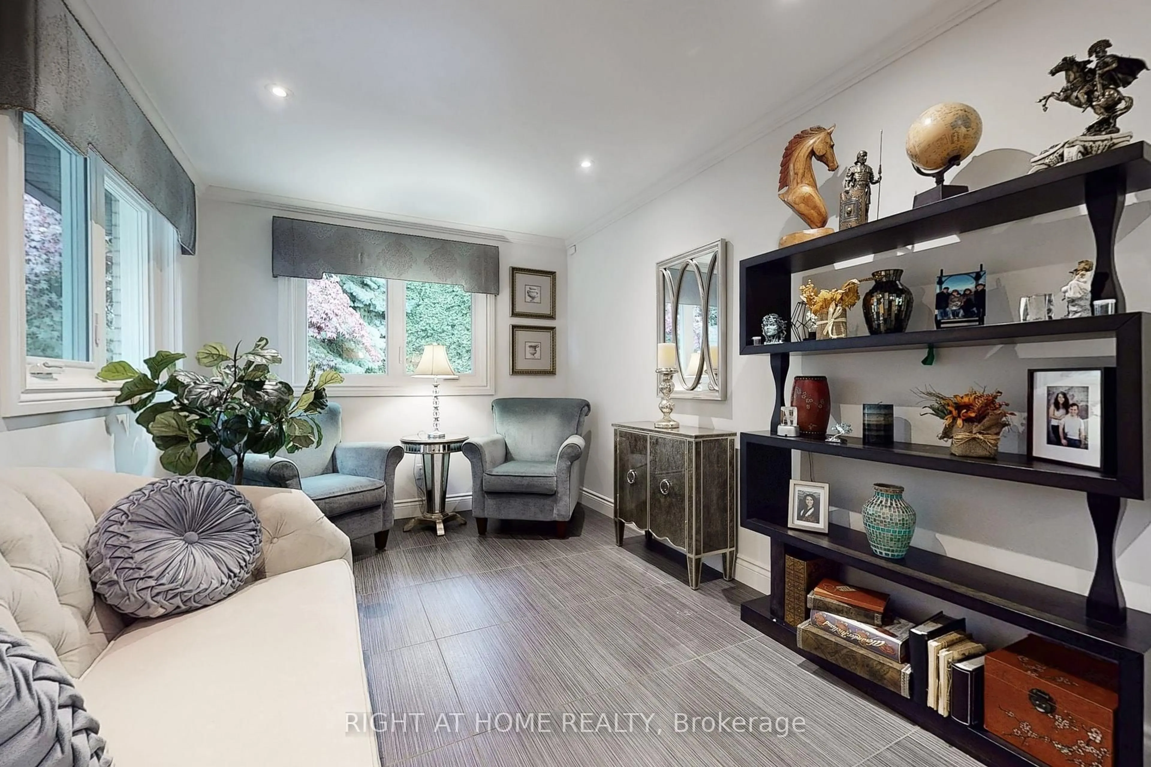 Living room with furniture, wood/laminate floor for 11 Tefley Rd, Toronto Ontario M2M 1C5