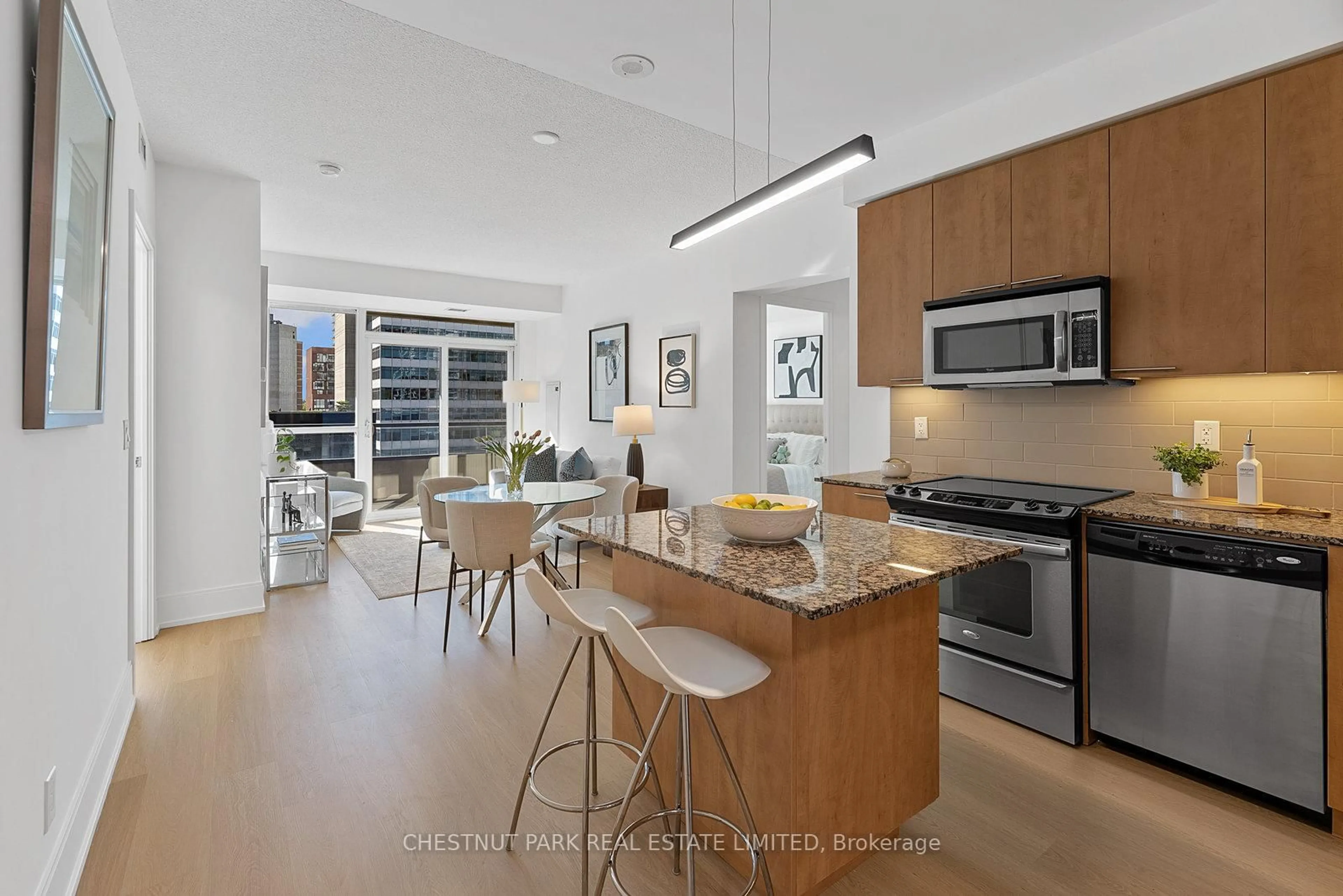 Open concept kitchen, unknown for 70 Roehampton Ave #719, Toronto Ontario M4P 1R2