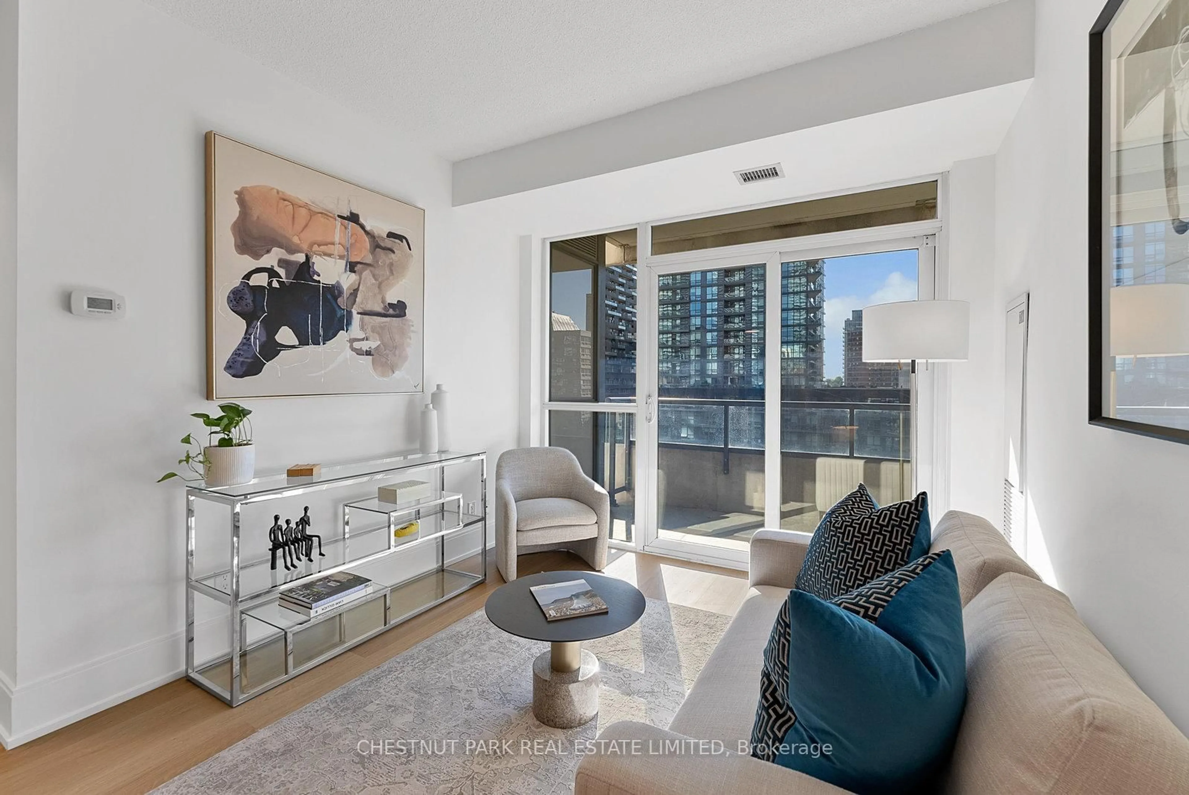 Living room with furniture, unknown for 70 Roehampton Ave #719, Toronto Ontario M4P 1R2