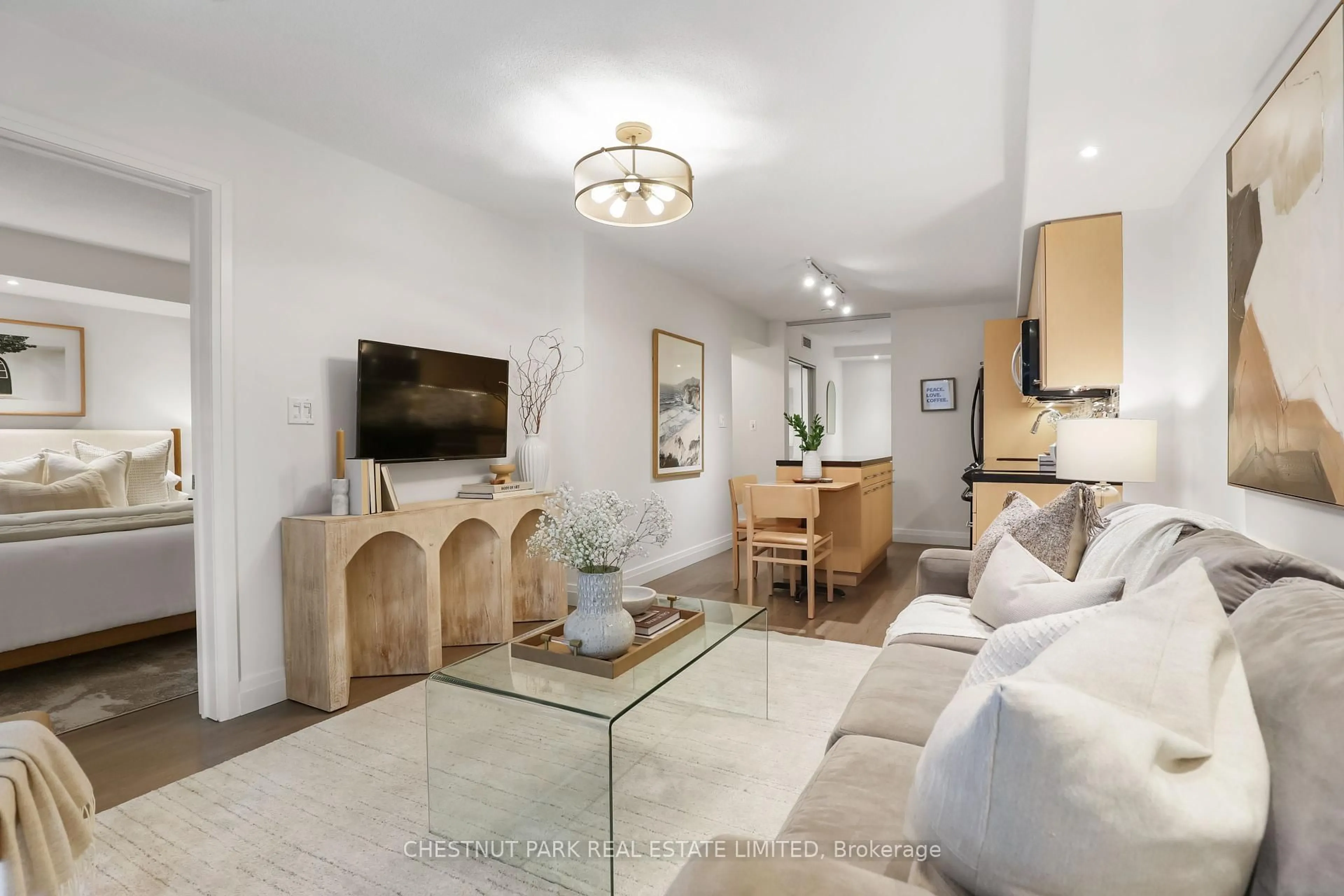 Living room with furniture, ceramic/tile floor for 126 Simcoe St #507, Toronto Ontario M5H 4E6