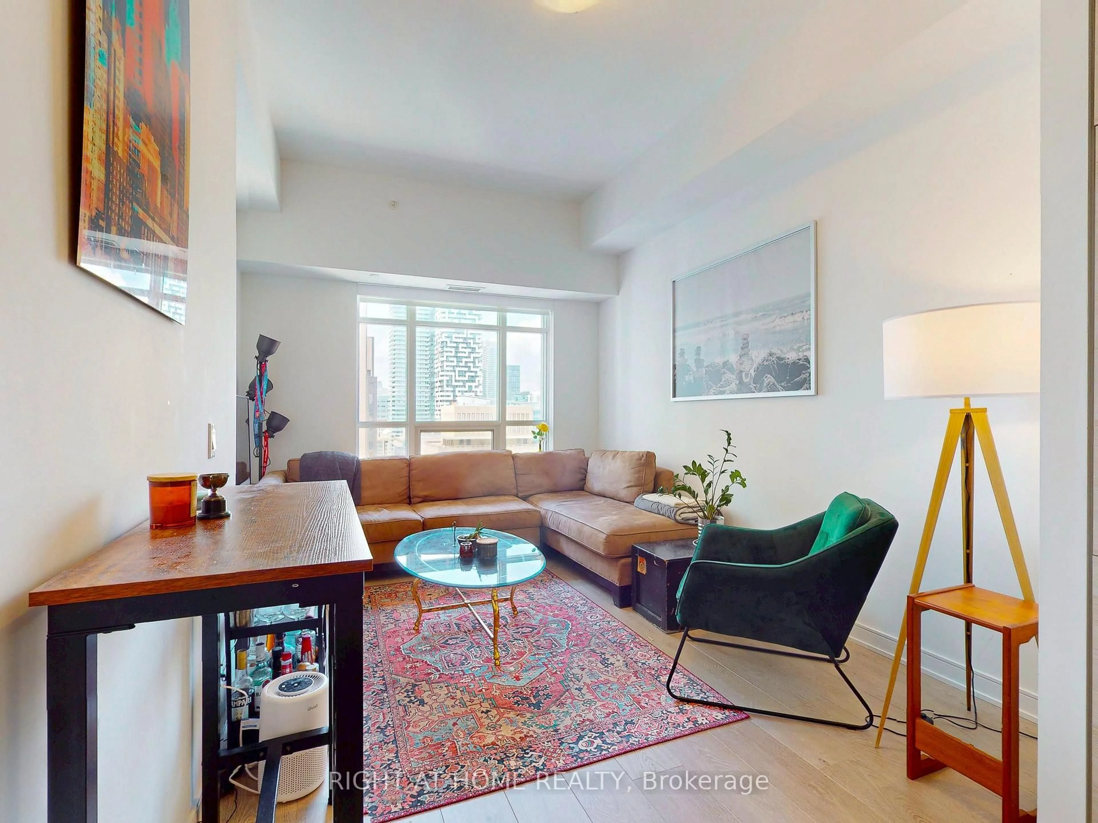 Living room with furniture, unknown for 88 Scott St #1904, Toronto Ontario M5E 0A9
