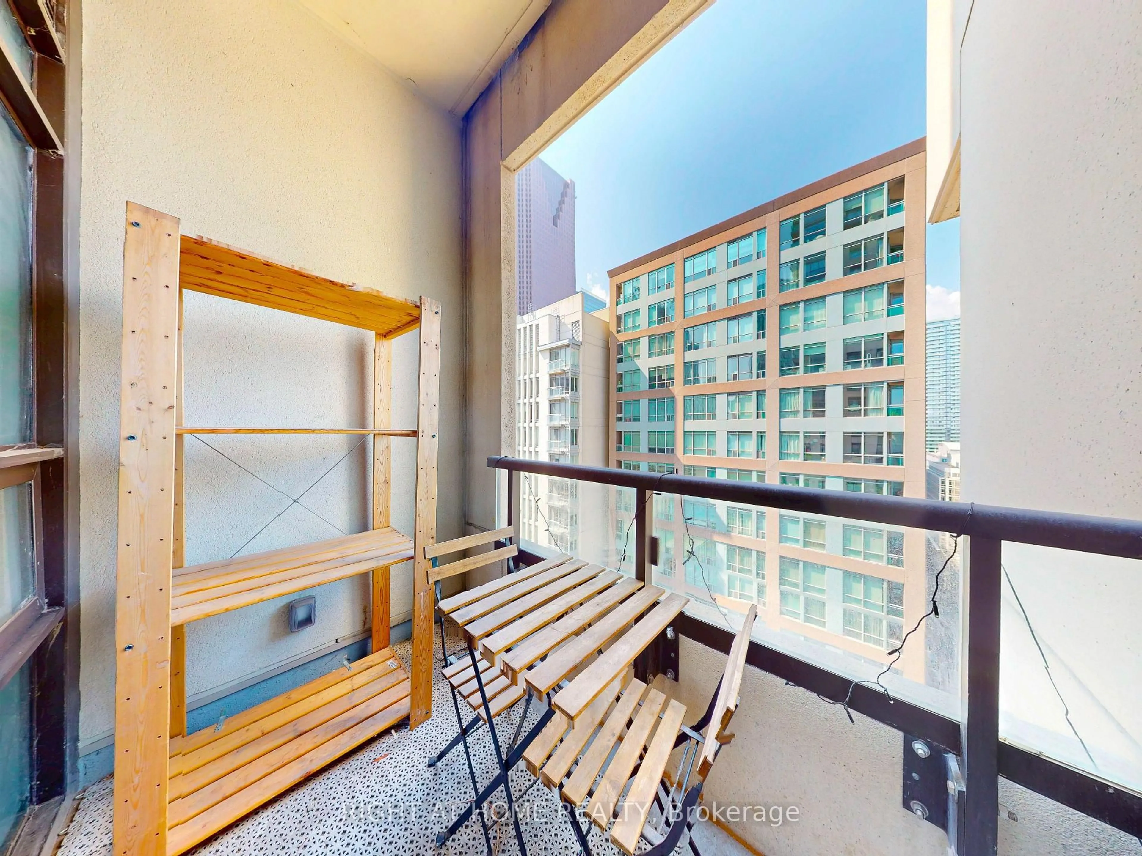 Balcony in the apartment, city buildings view from balcony for 88 Scott St #1904, Toronto Ontario M5E 0A9