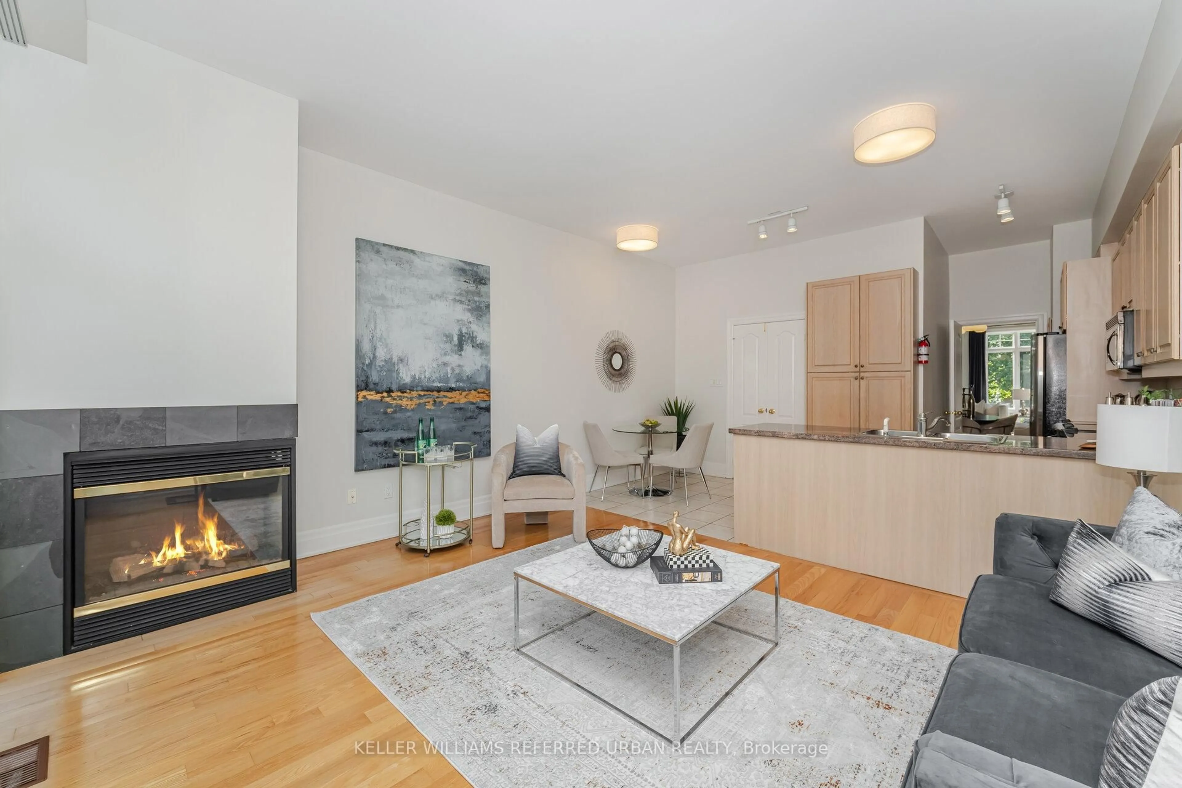 Living room with furniture, wood/laminate floor for 397 Brunswick Ave #5, Toronto Ontario M5R 2Z2
