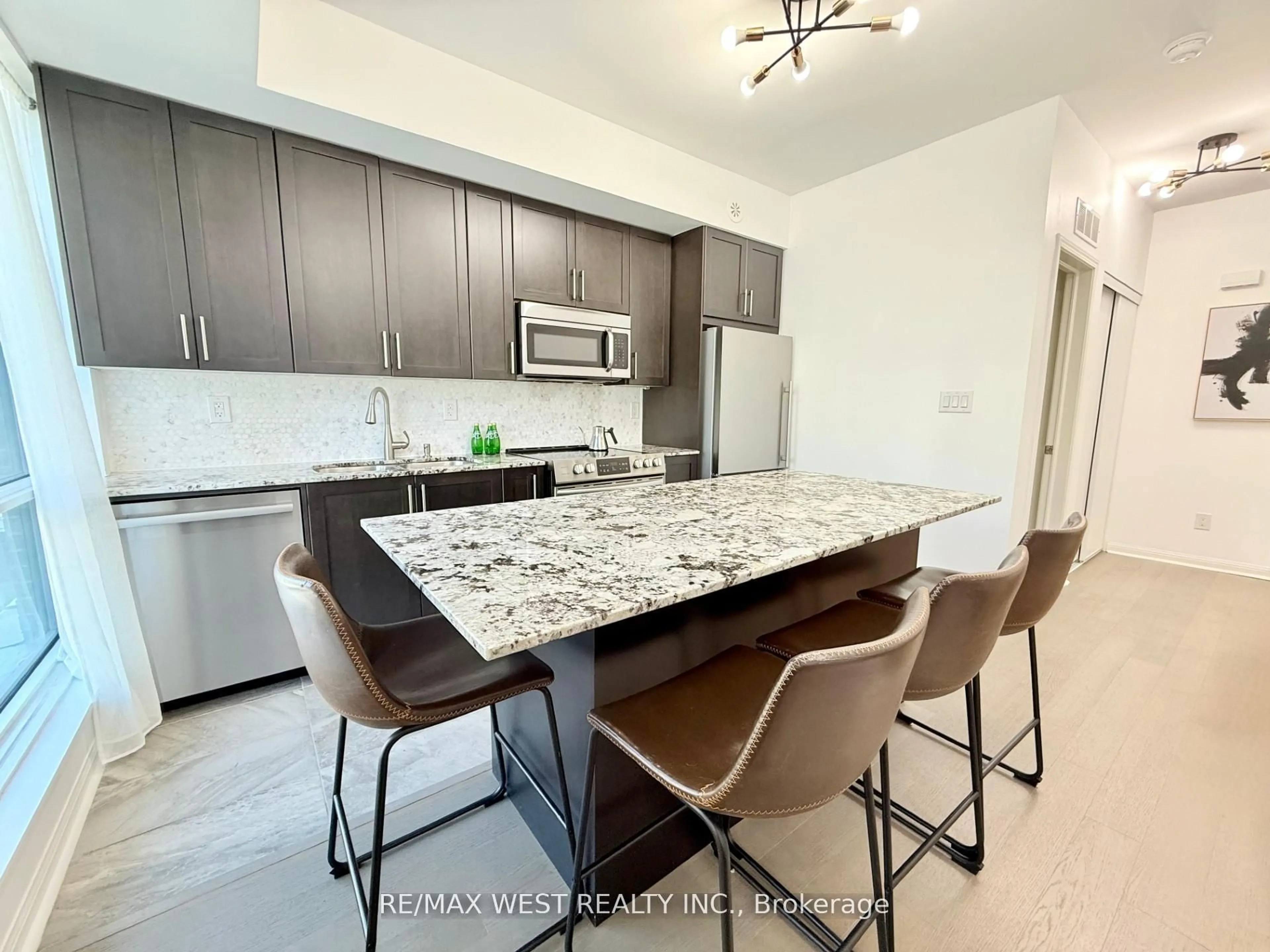 Open concept kitchen, ceramic/tile floor for 639 Lawrence Ave #310, Toronto Ontario M6A 1A9