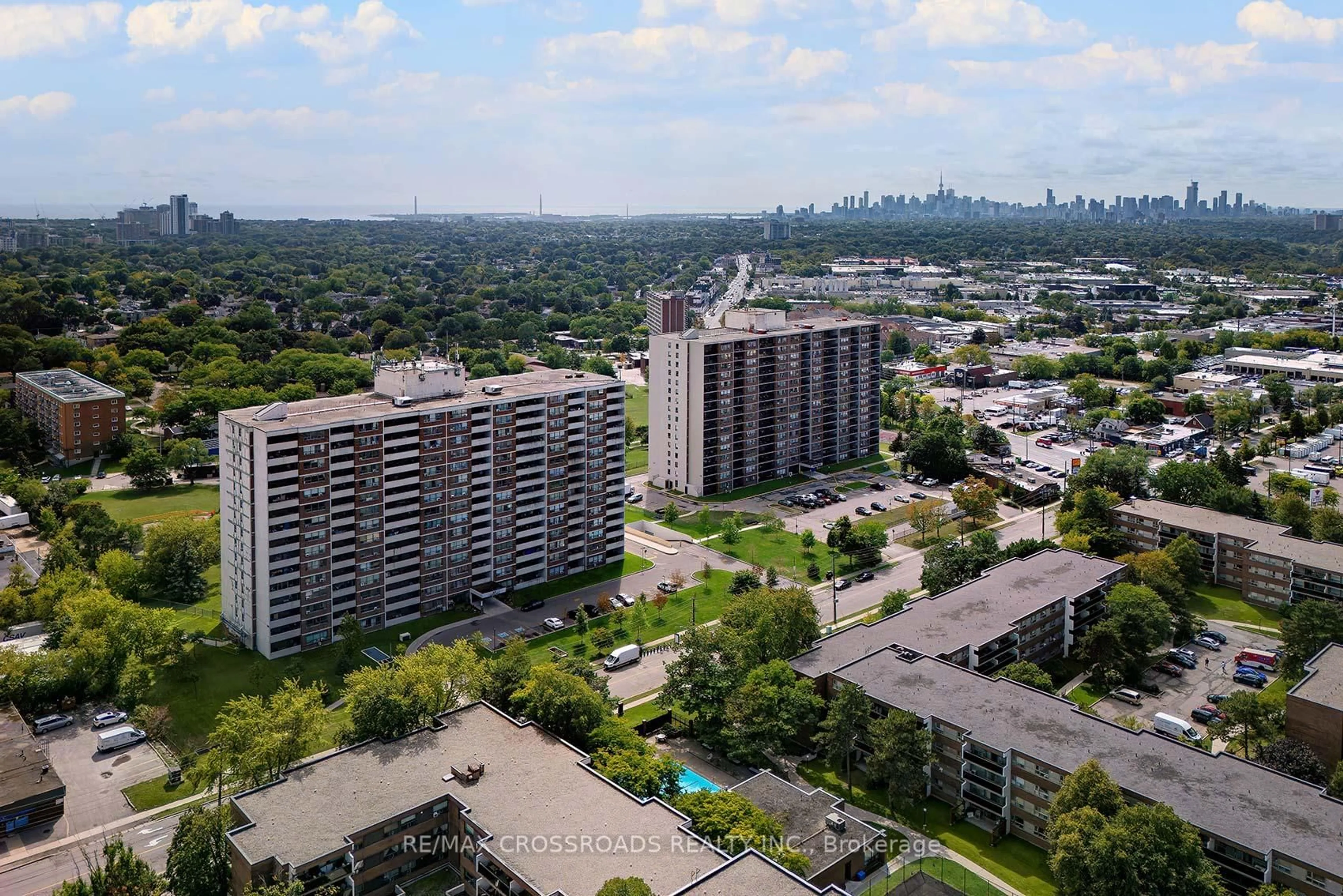 A pic from outside/outdoor area/front of a property/back of a property/a pic from drone, city buildings view from balcony for 25 Sunrise Ave #210, Toronto Ontario M4A 2S2