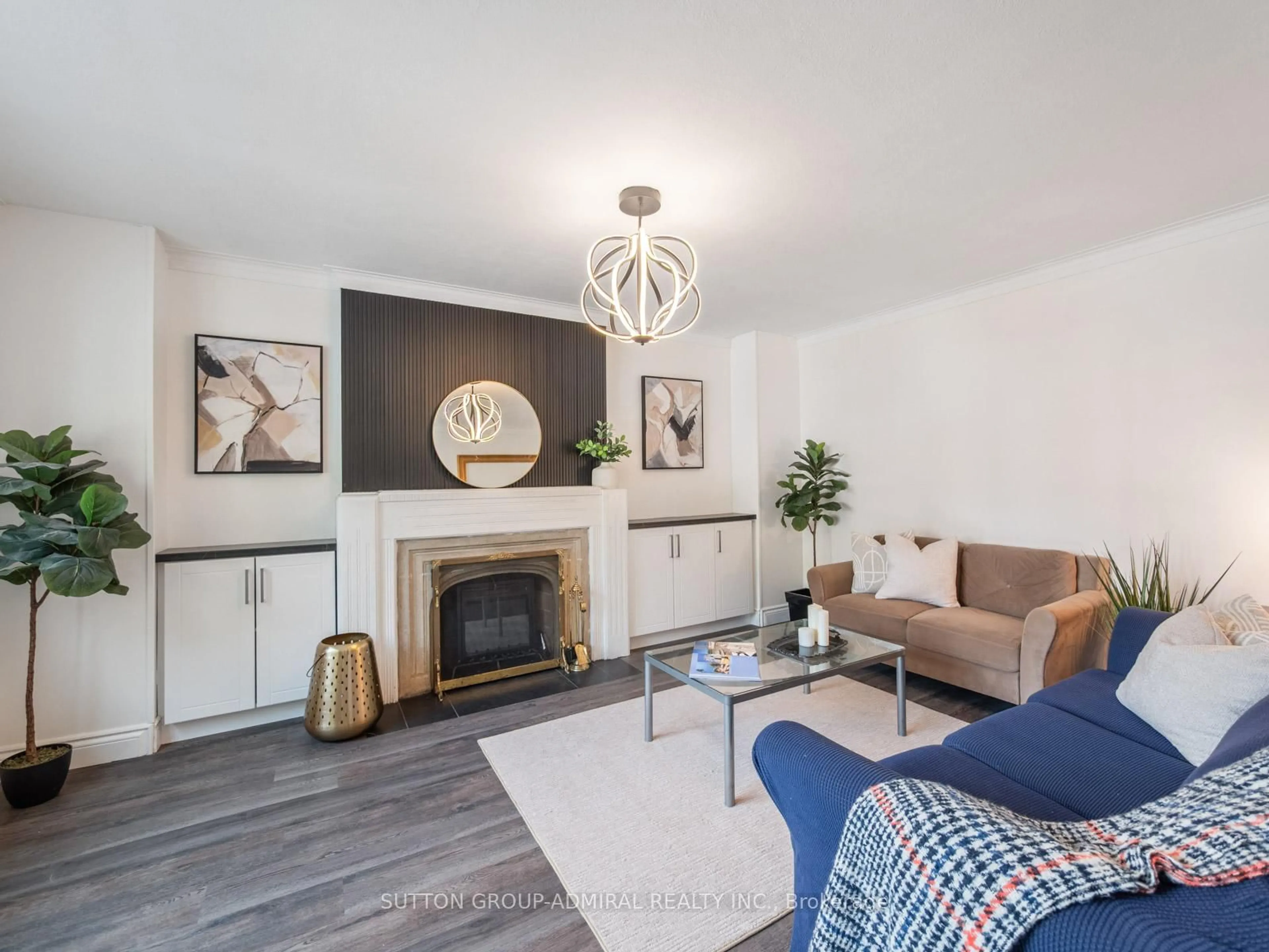 Living room with furniture, wood/laminate floor for 759 Eglinton Ave, Toronto Ontario M4G 2K8