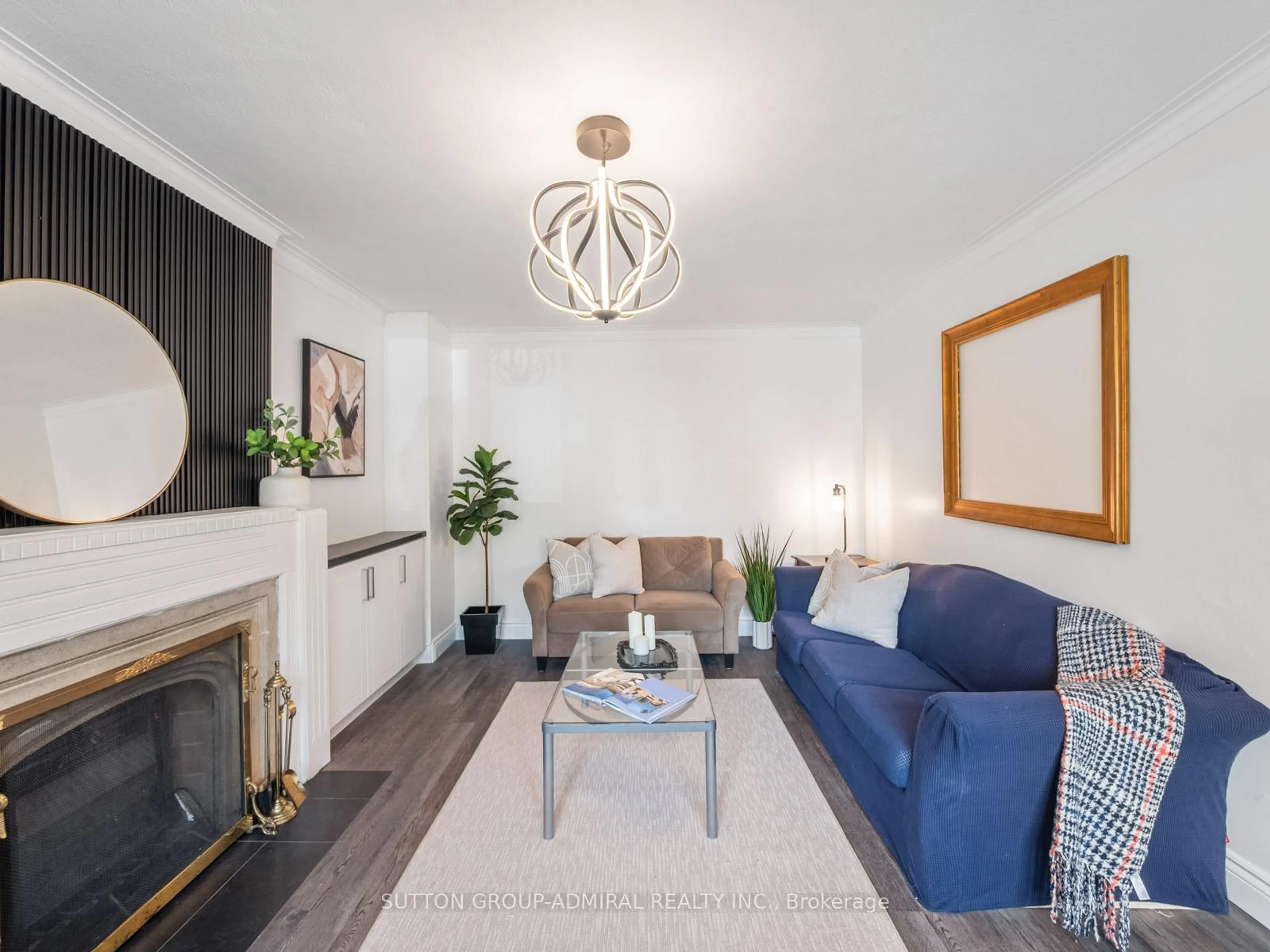 Living room with furniture, wood/laminate floor for 759 Eglinton Ave, Toronto Ontario M4G 2K8