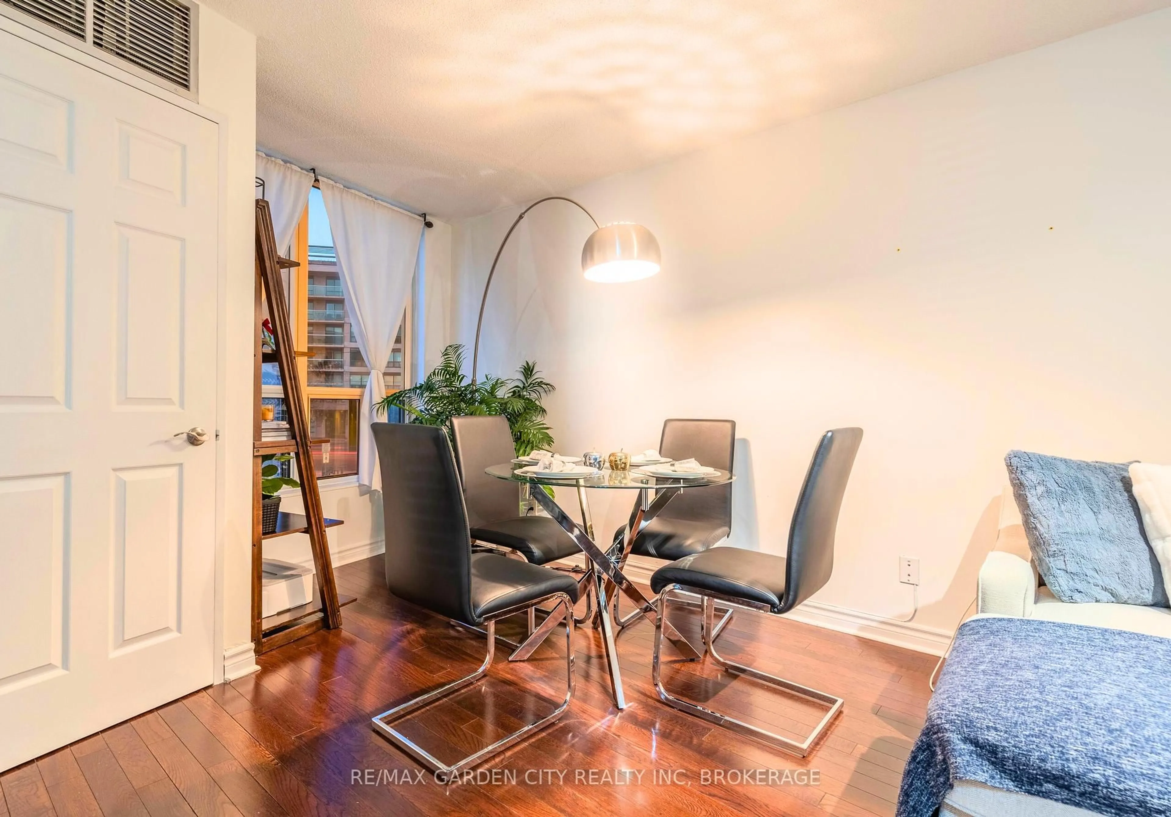 Dining room, wood/laminate floor for 897 Sheppard Ave #202, Toronto Ontario M3H 2T4