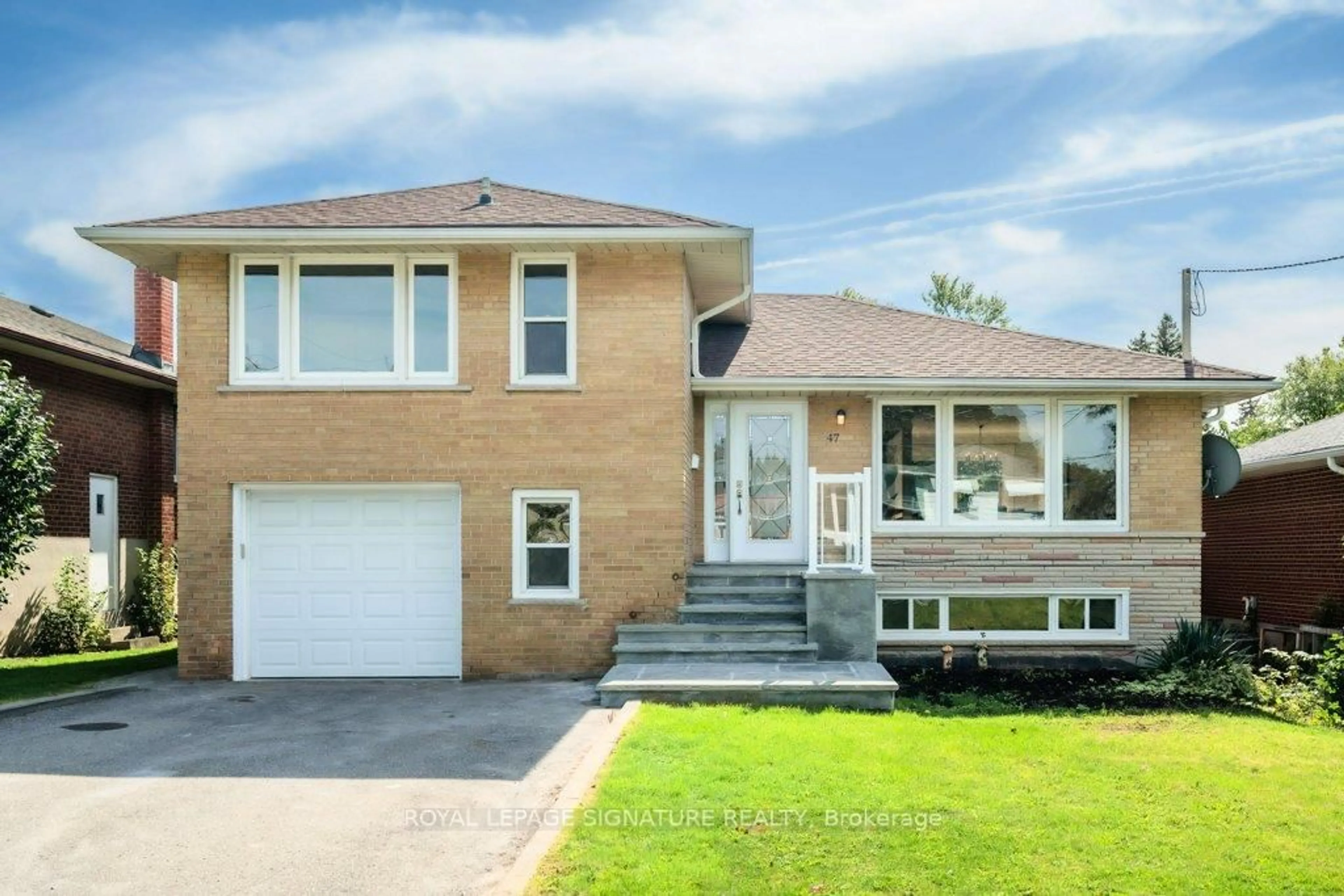 Home with vinyl exterior material, street for 47 SWEENEY Dr, Toronto Ontario M4A 1T4