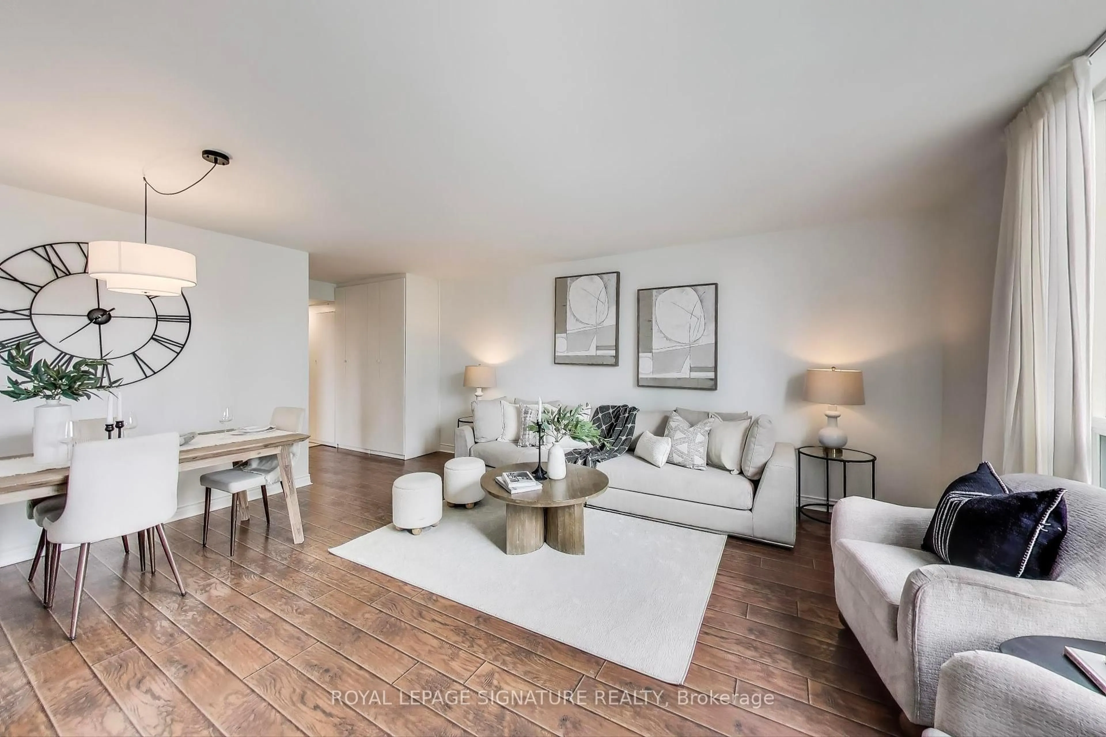 Living room with furniture, wood/laminate floor for 256 Doris Ave #1610, Toronto Ontario M2N 6X8