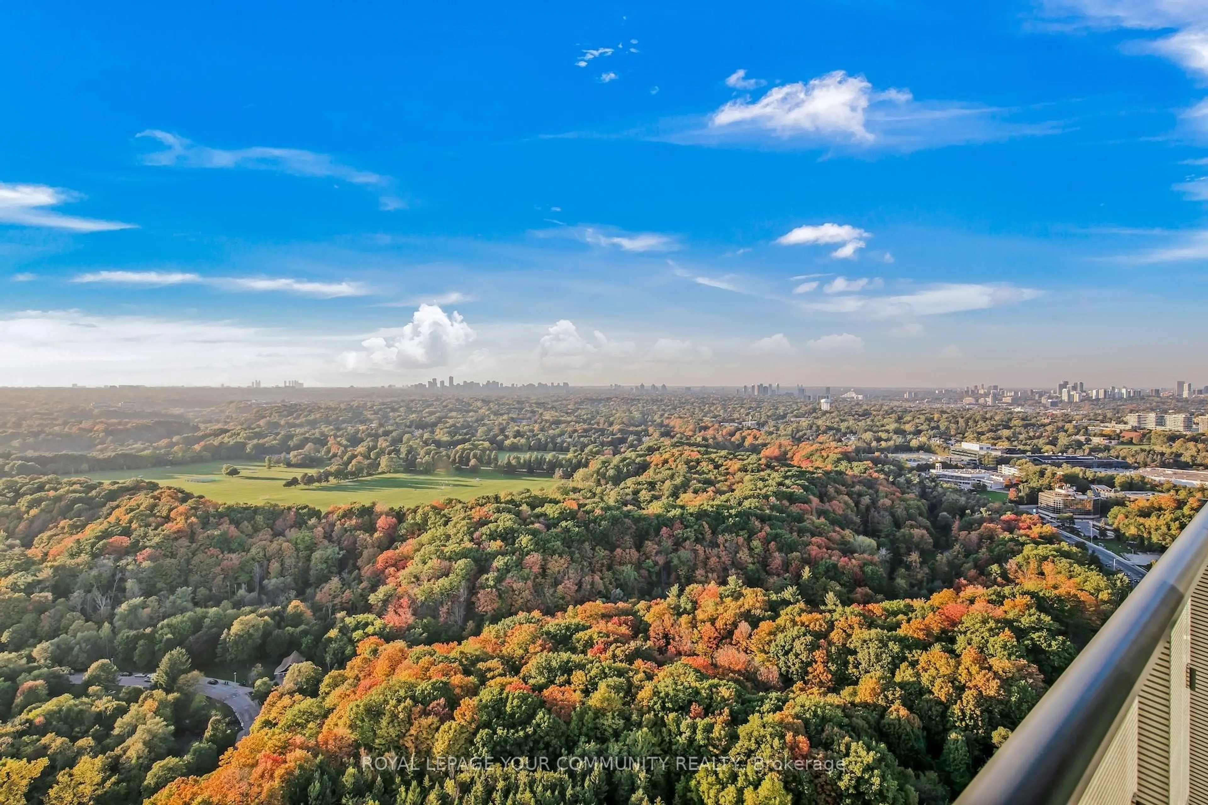 A pic from outside/outdoor area/front of a property/back of a property/a pic from drone, forest/trees view for 10 Inn On The Park Dr #3303, Toronto Ontario M3C 0P9