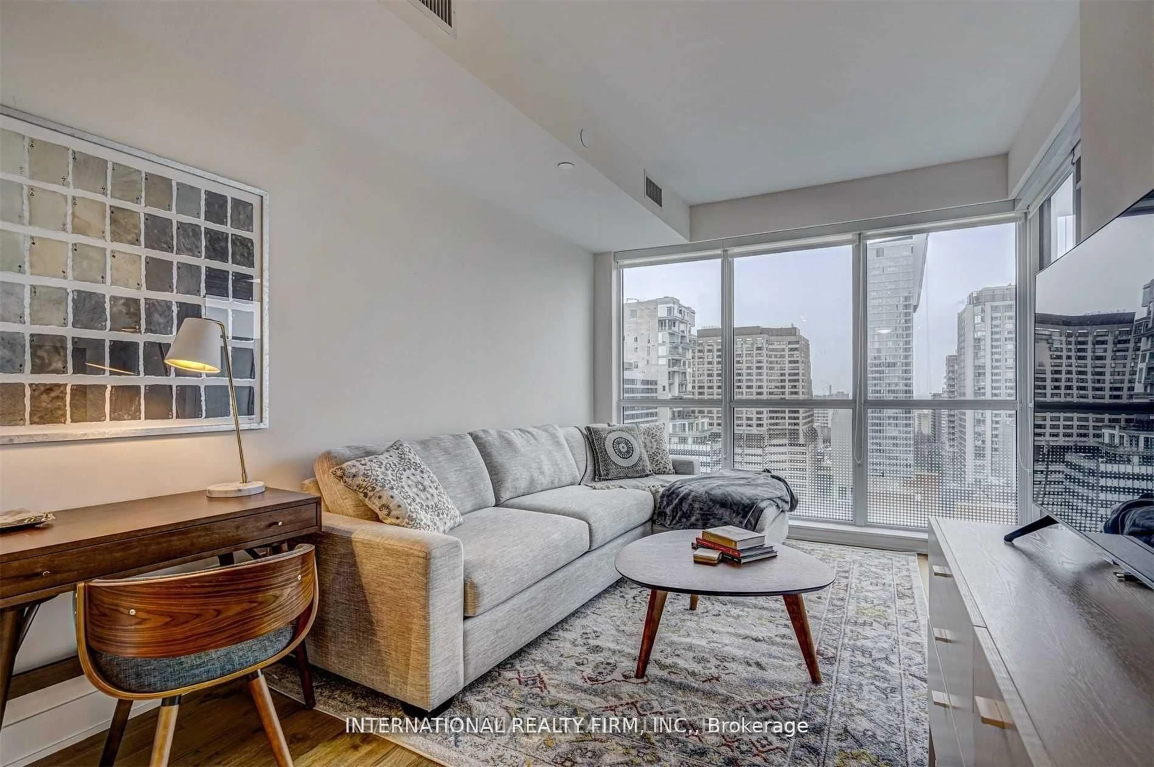 Living room with furniture, unknown for 88 Cumberland St #1903, Toronto Ontario M5R 3V1