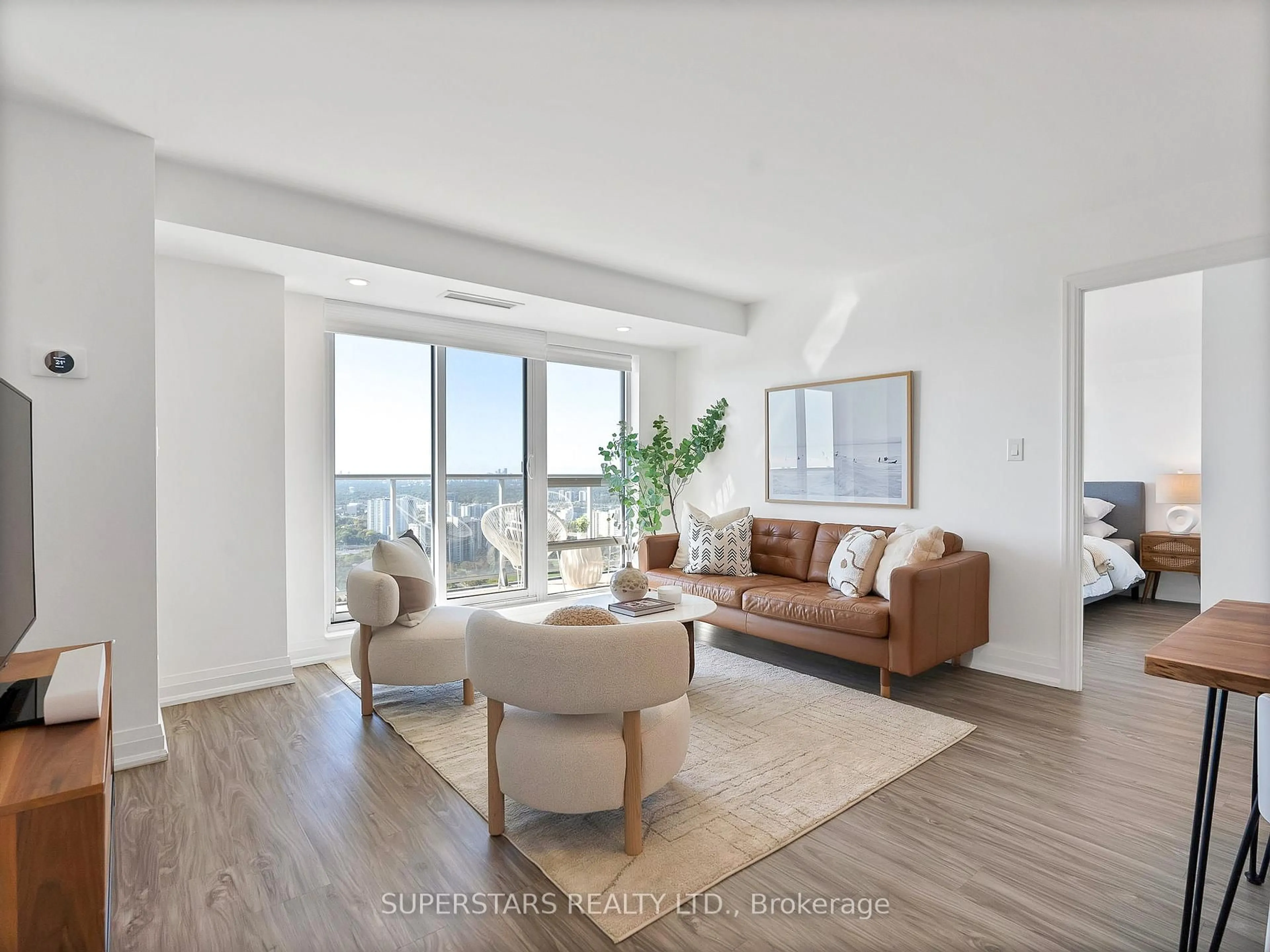 Living room with furniture, wood/laminate floor for 2015 Sheppard Ave #3810, Toronto Ontario M2J 0B3