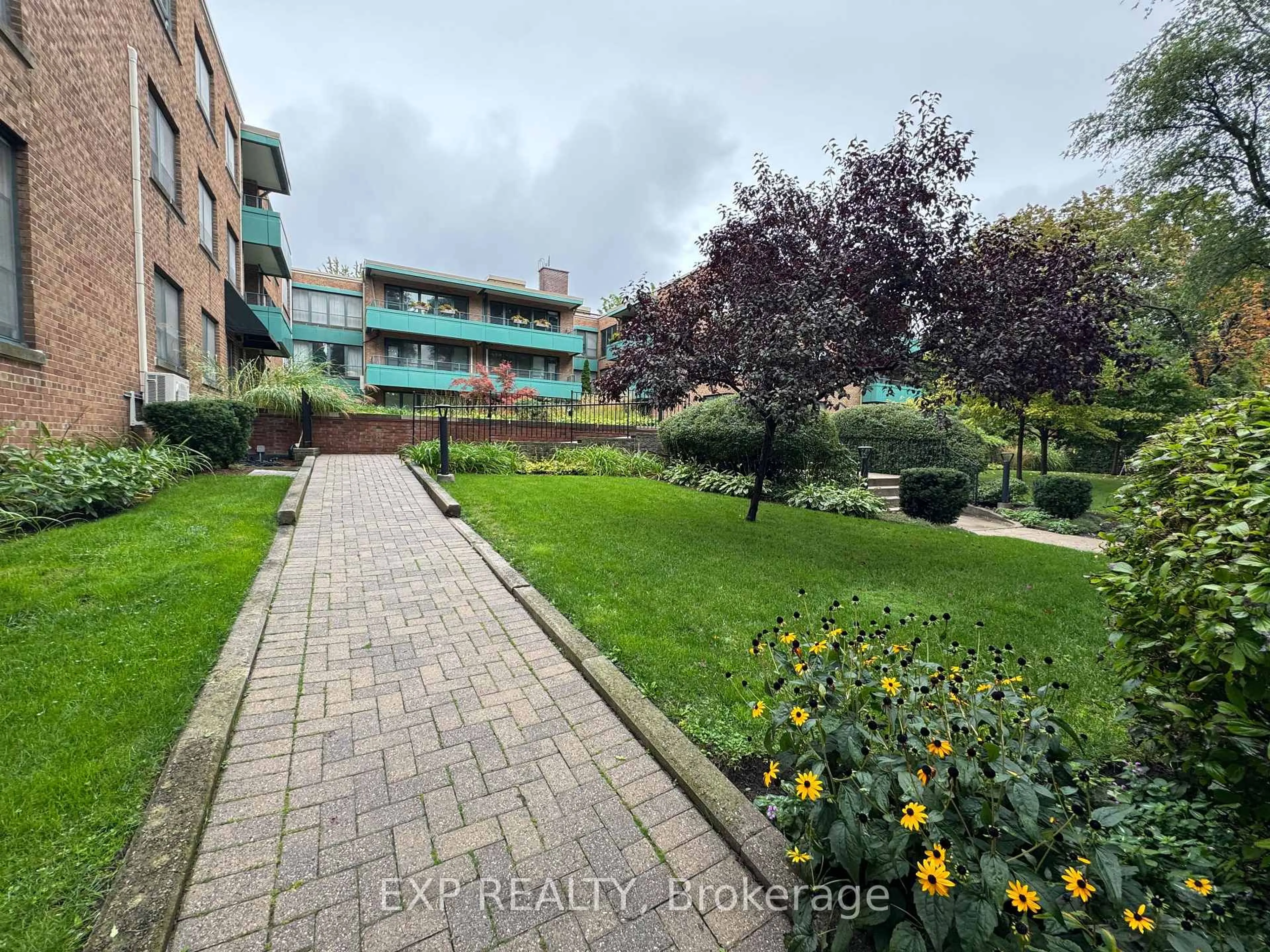 A pic from outside/outdoor area/front of a property/back of a property/a pic from drone, street for 30 elm Ave #104, Toronto Ontario M4W 1N5