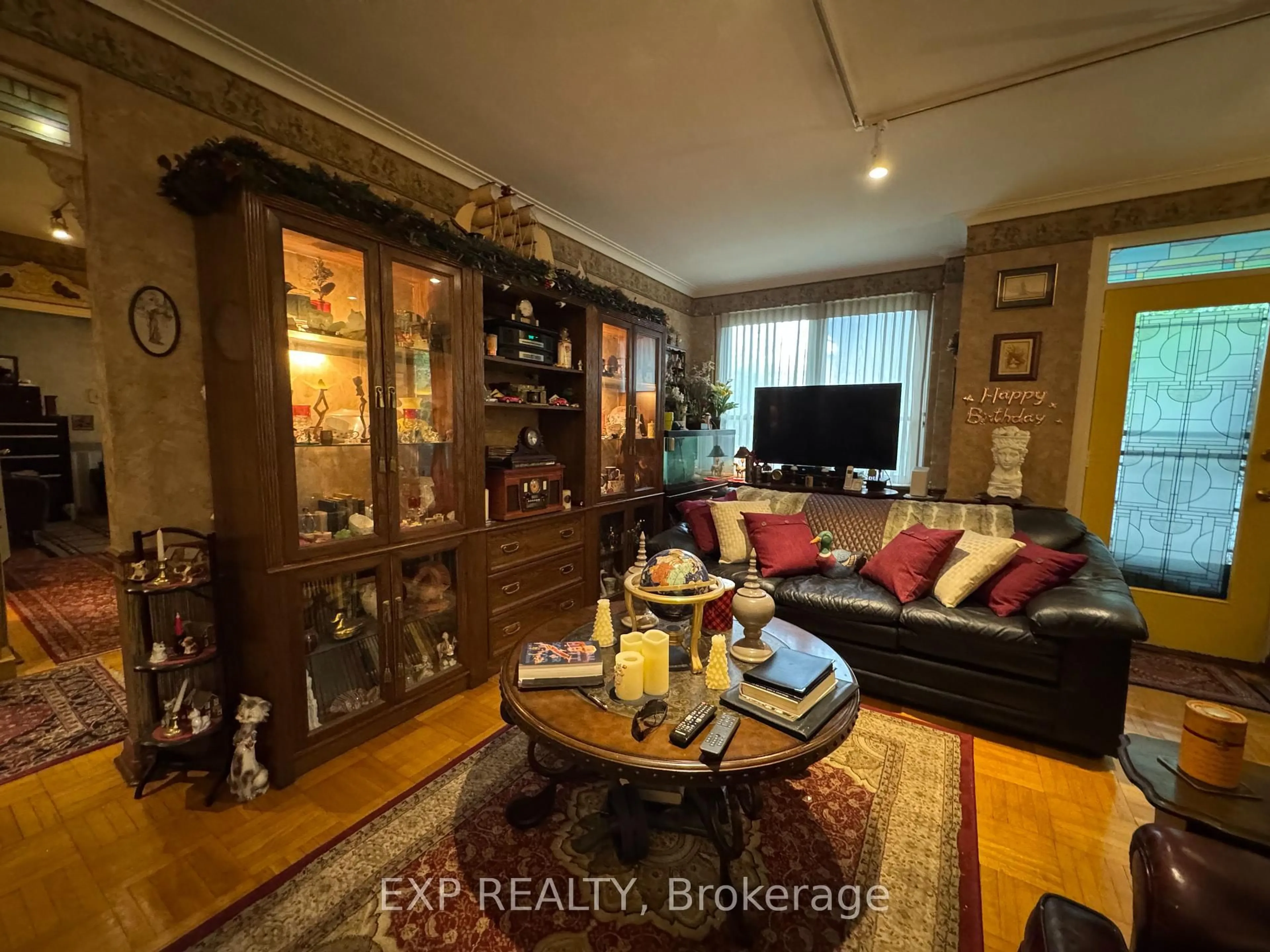 Living room with furniture, wood/laminate floor for 30 elm Ave #104, Toronto Ontario M4W 1N5