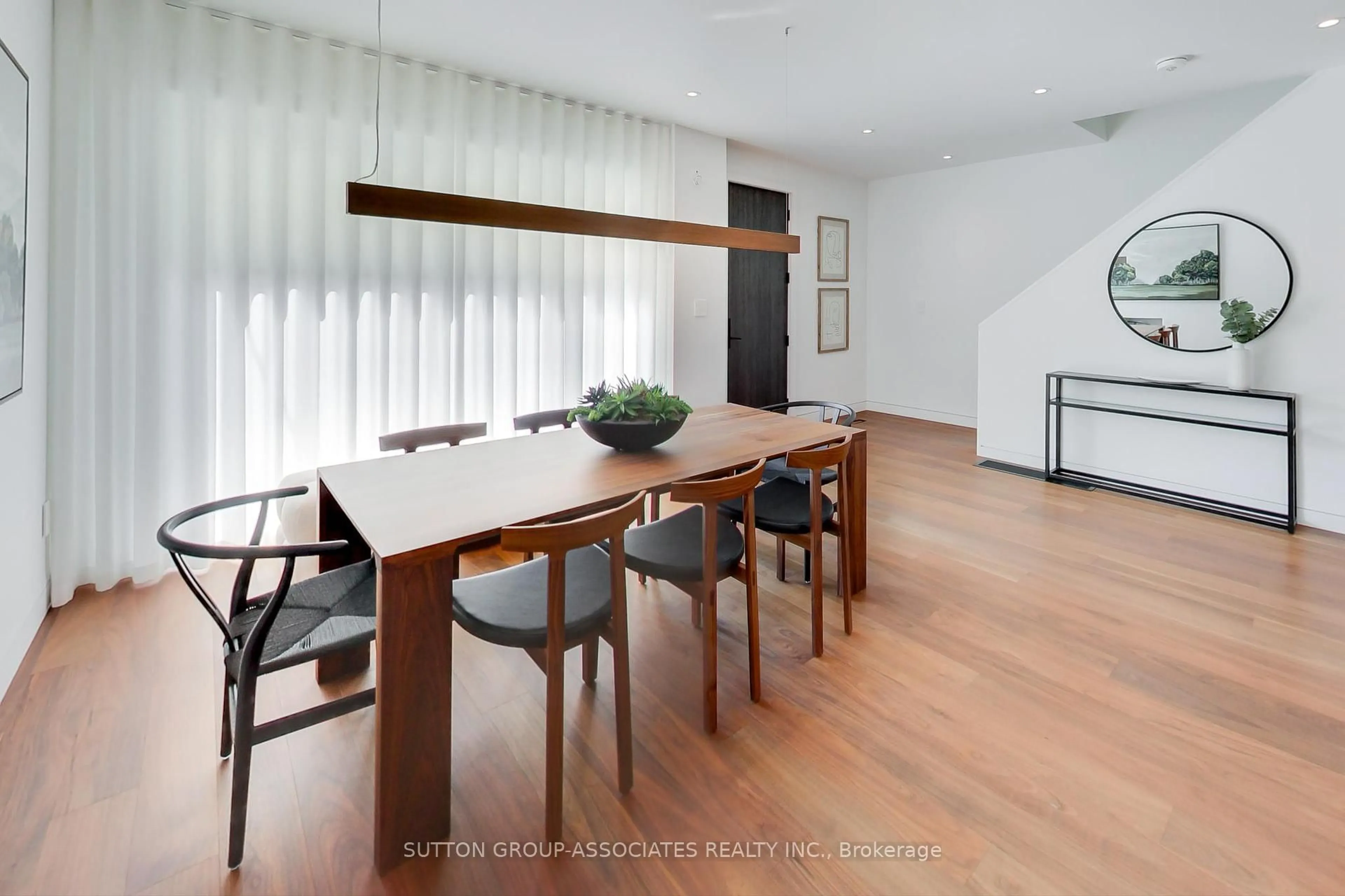 Dining room, wood/laminate floor for 83 Pinewood Ave, Toronto Ontario M6C 2V2