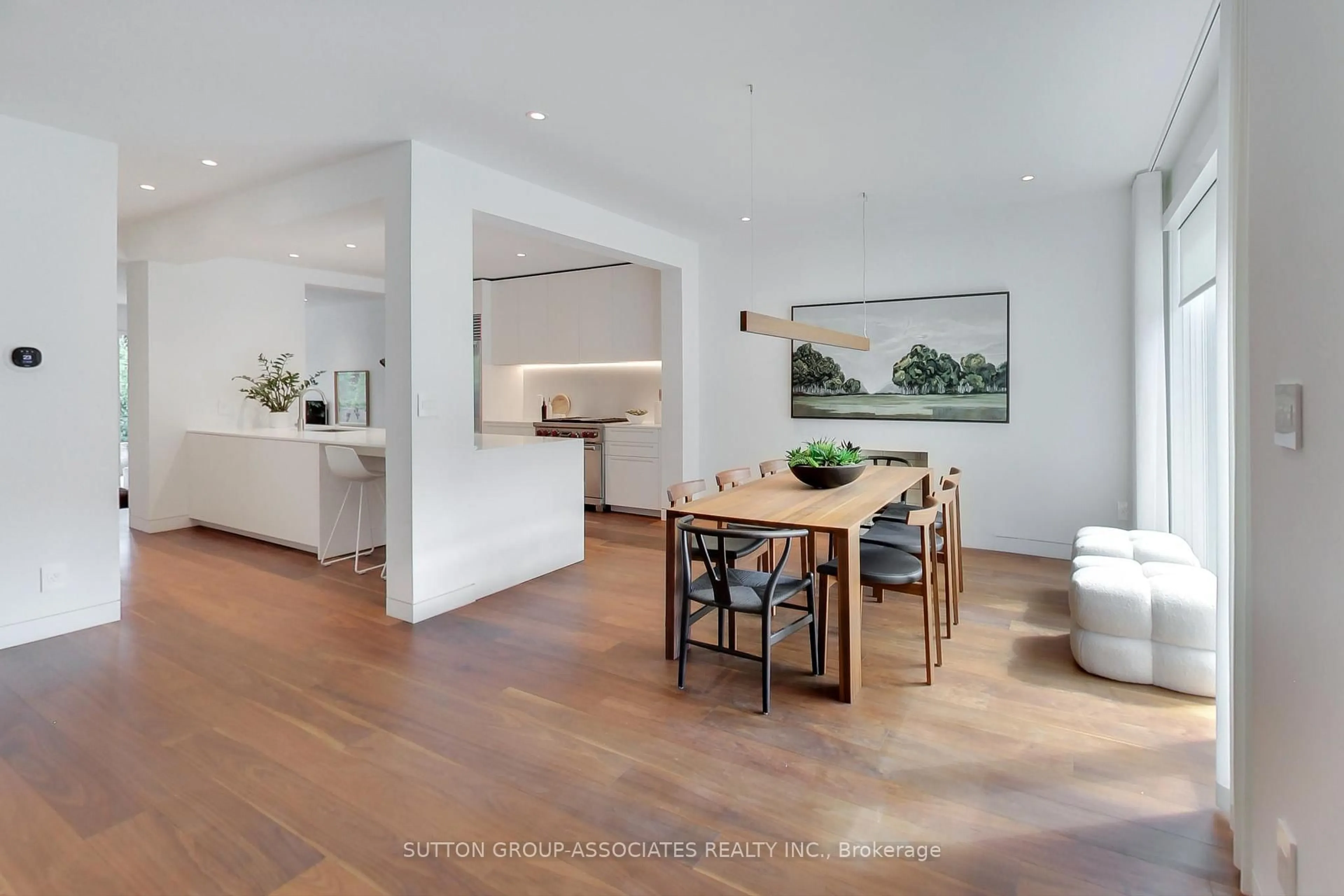 Open concept kitchen, wood/laminate floor for 83 Pinewood Ave, Toronto Ontario M6C 2V2