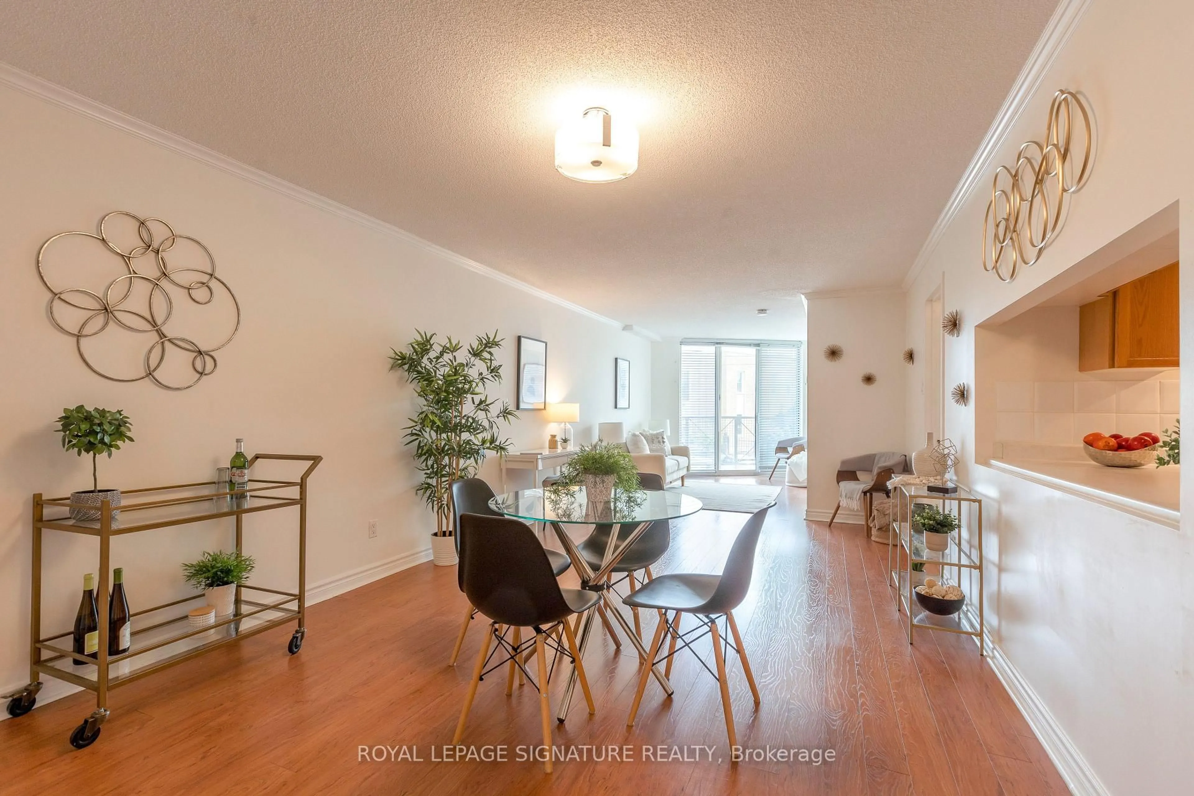 Dining room, wood/laminate floor for 356 McRae Dr #206, Toronto Ontario M4G 4G4
