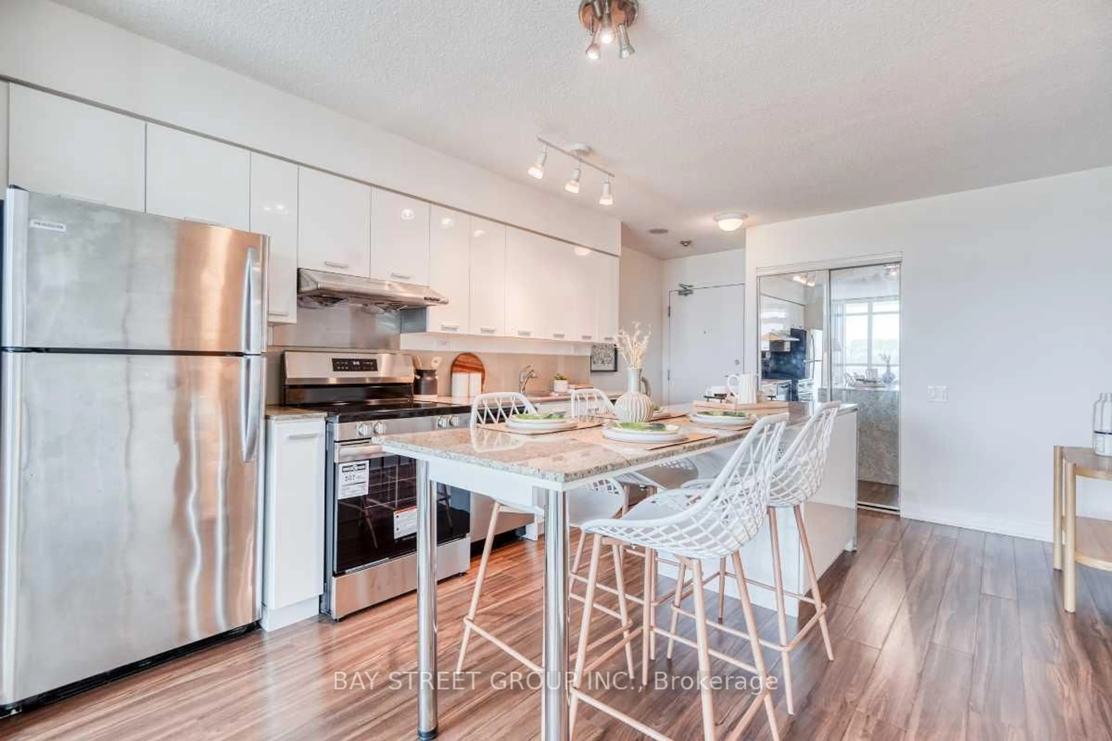 Open concept kitchen, wood/laminate floor for 29 Singer Crt #512, Toronto Ontario M2K 0B3