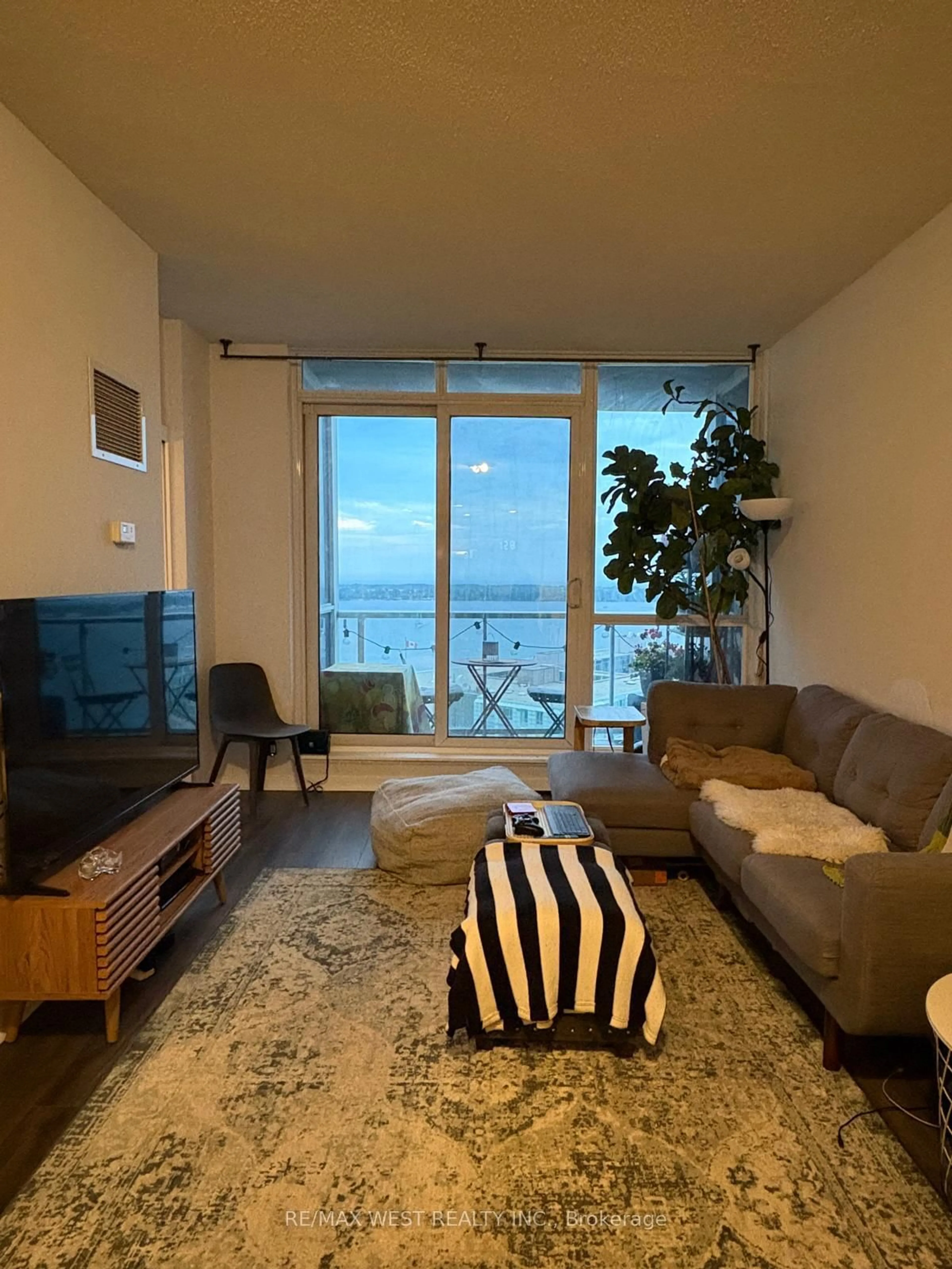 Living room with furniture, unknown for 218 Queens Quay #2204, Toronto Ontario M5J 2Y6