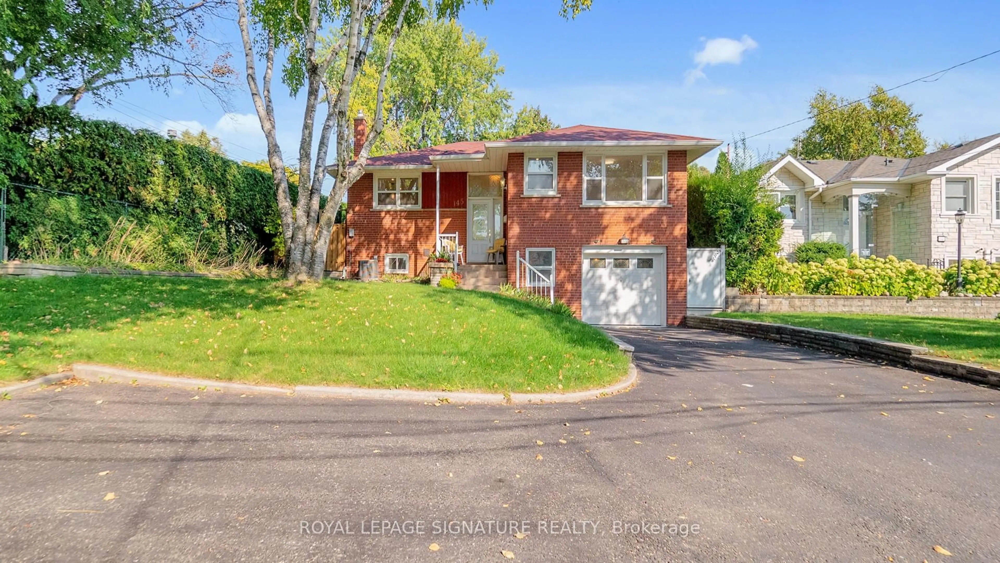 Home with brick exterior material, street for 145 Sloane Ave, Toronto Ontario M4A 2B8