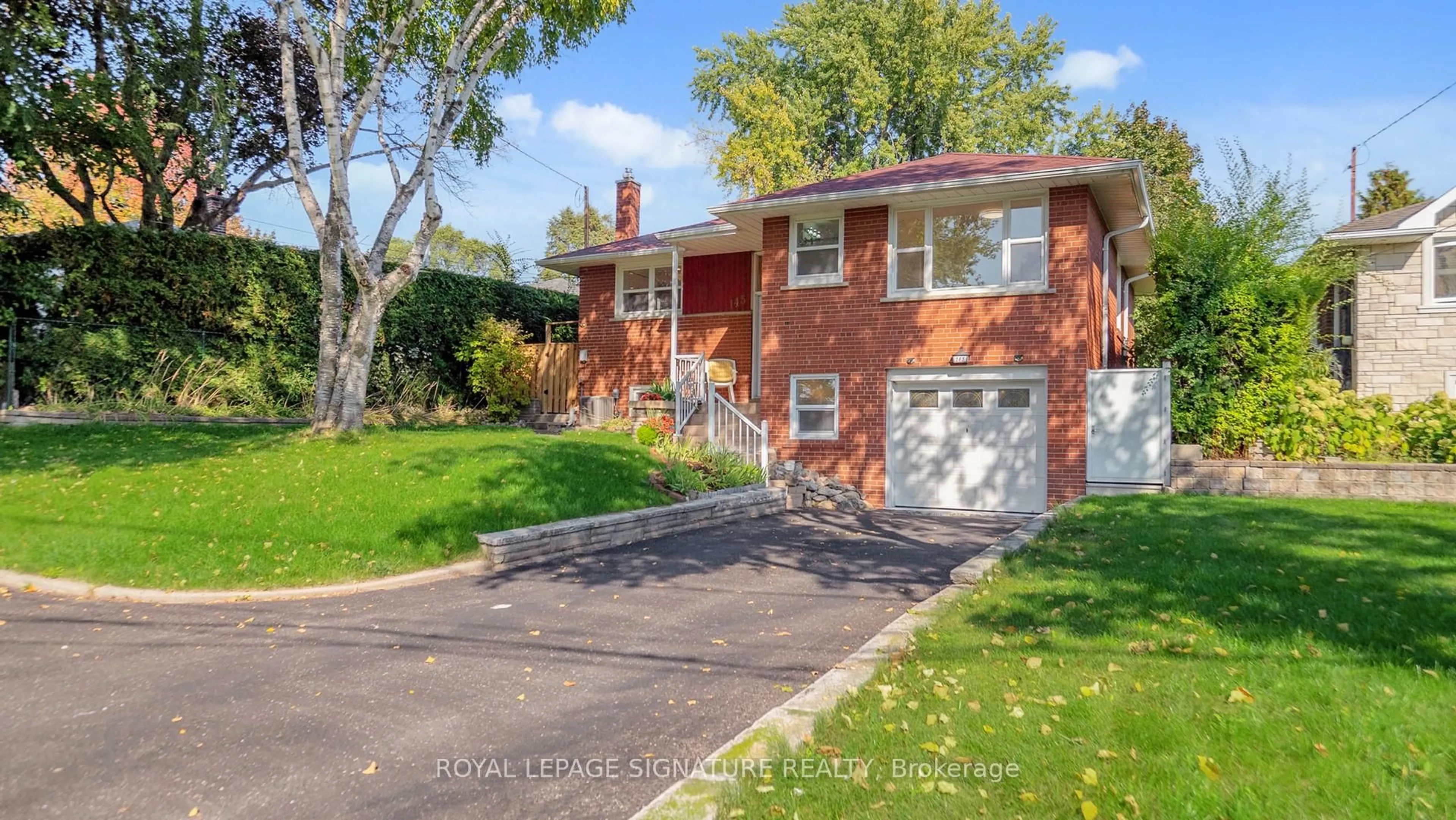 Home with brick exterior material, street for 145 Sloane Ave, Toronto Ontario M4A 2B8