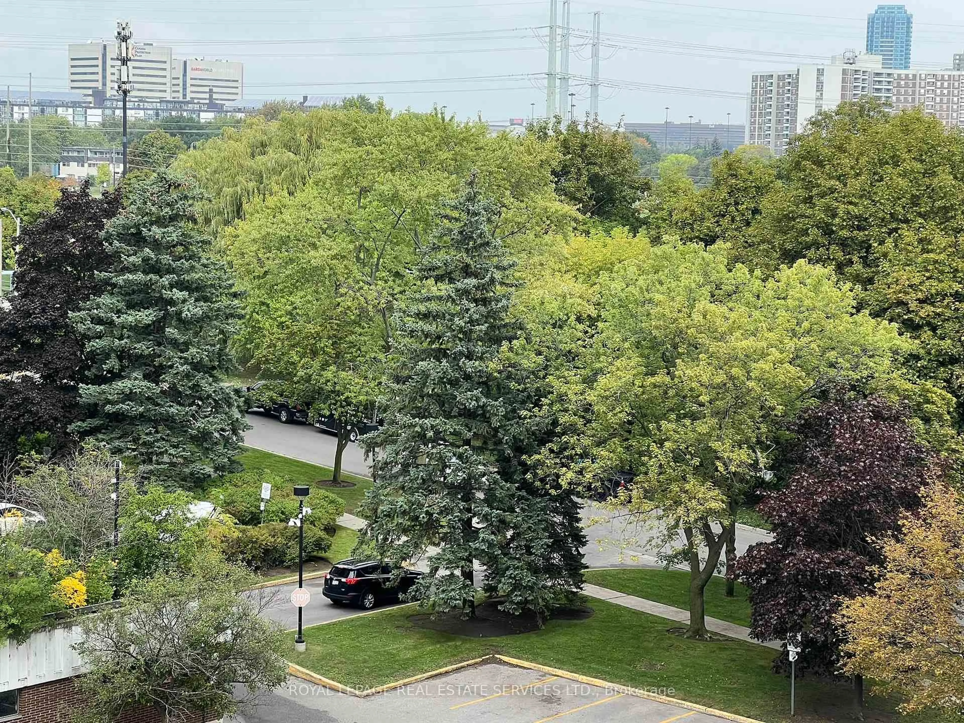 A pic from outside/outdoor area/front of a property/back of a property/a pic from drone, city buildings view from balcony for 60 Pavane Linkway #709, Toronto Ontario M3C 2Y6