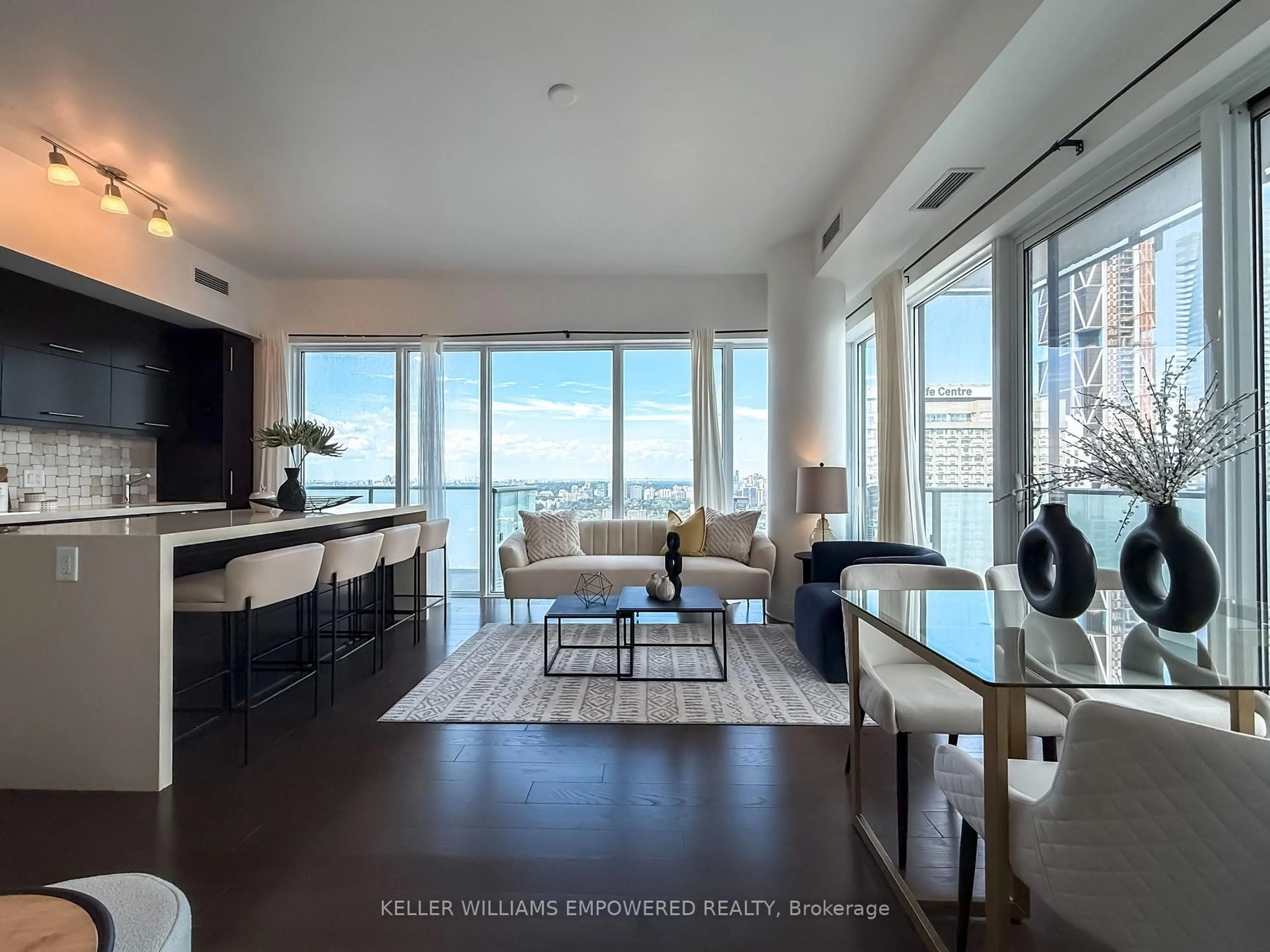 Living room with furniture, wood/laminate floor for 1080 Bay St #4508, Toronto Ontario M5S 0A5