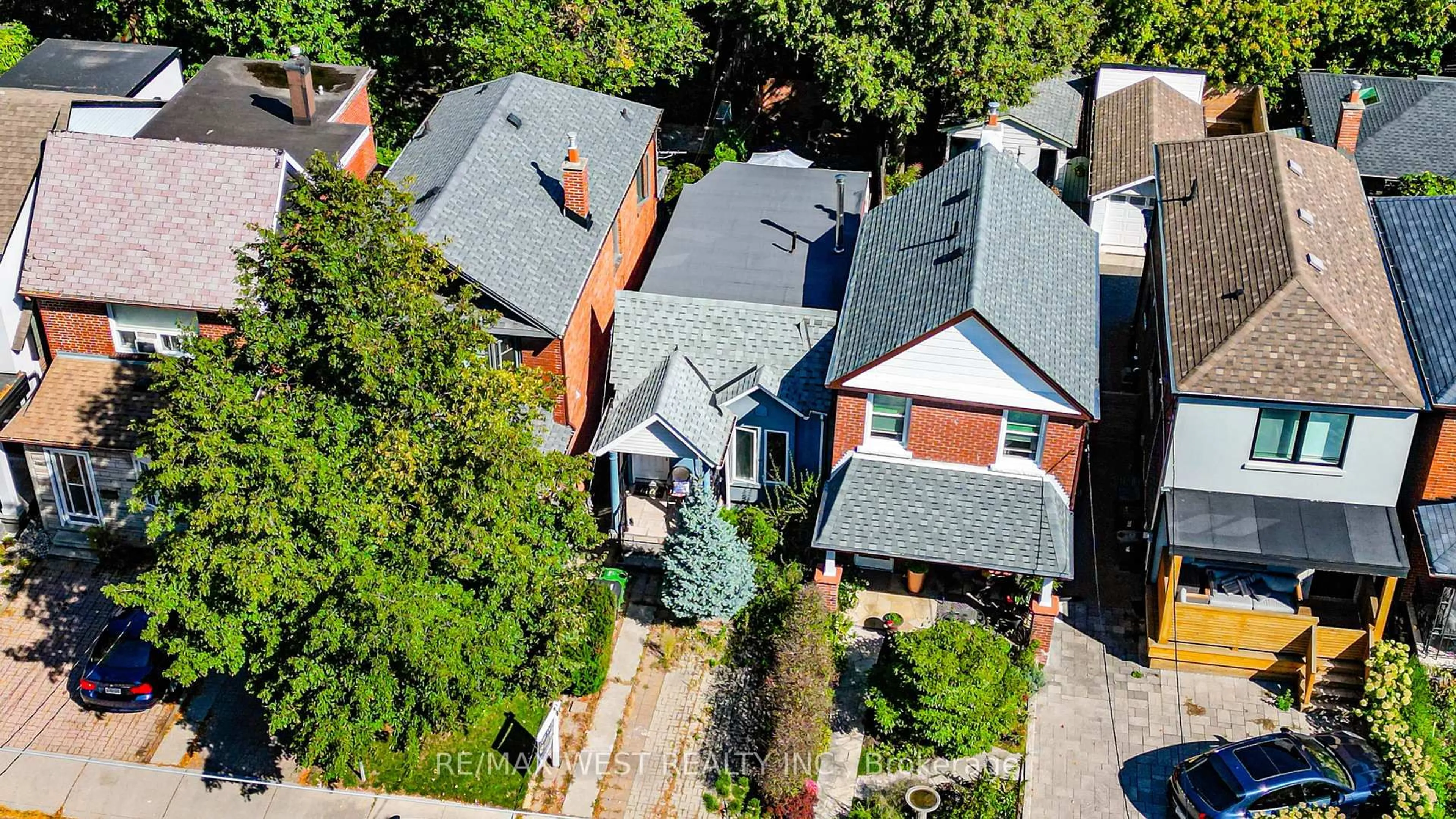 A pic from outside/outdoor area/front of a property/back of a property/a pic from drone, street for 165 Robina Ave, Toronto Ontario M6C 3Y8