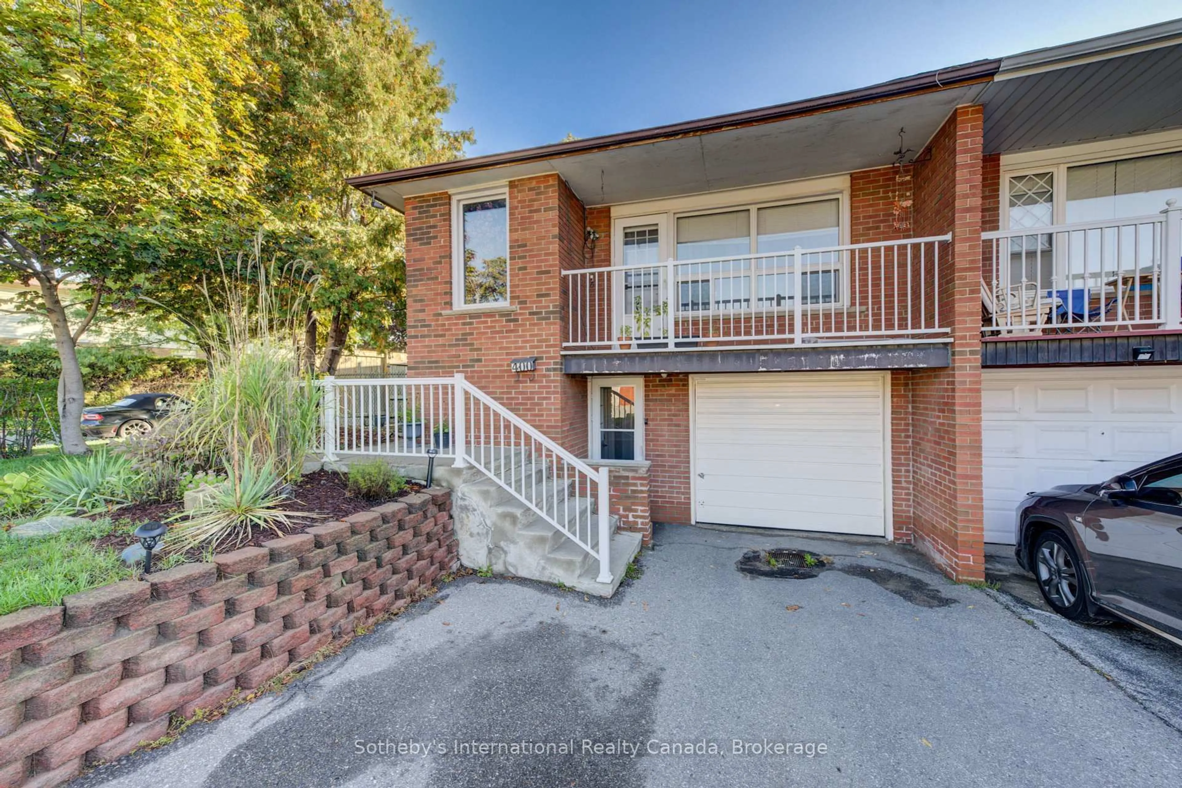 Home with brick exterior material, street for 400 Cherokee Blvd, Toronto Ontario M2H 2W7