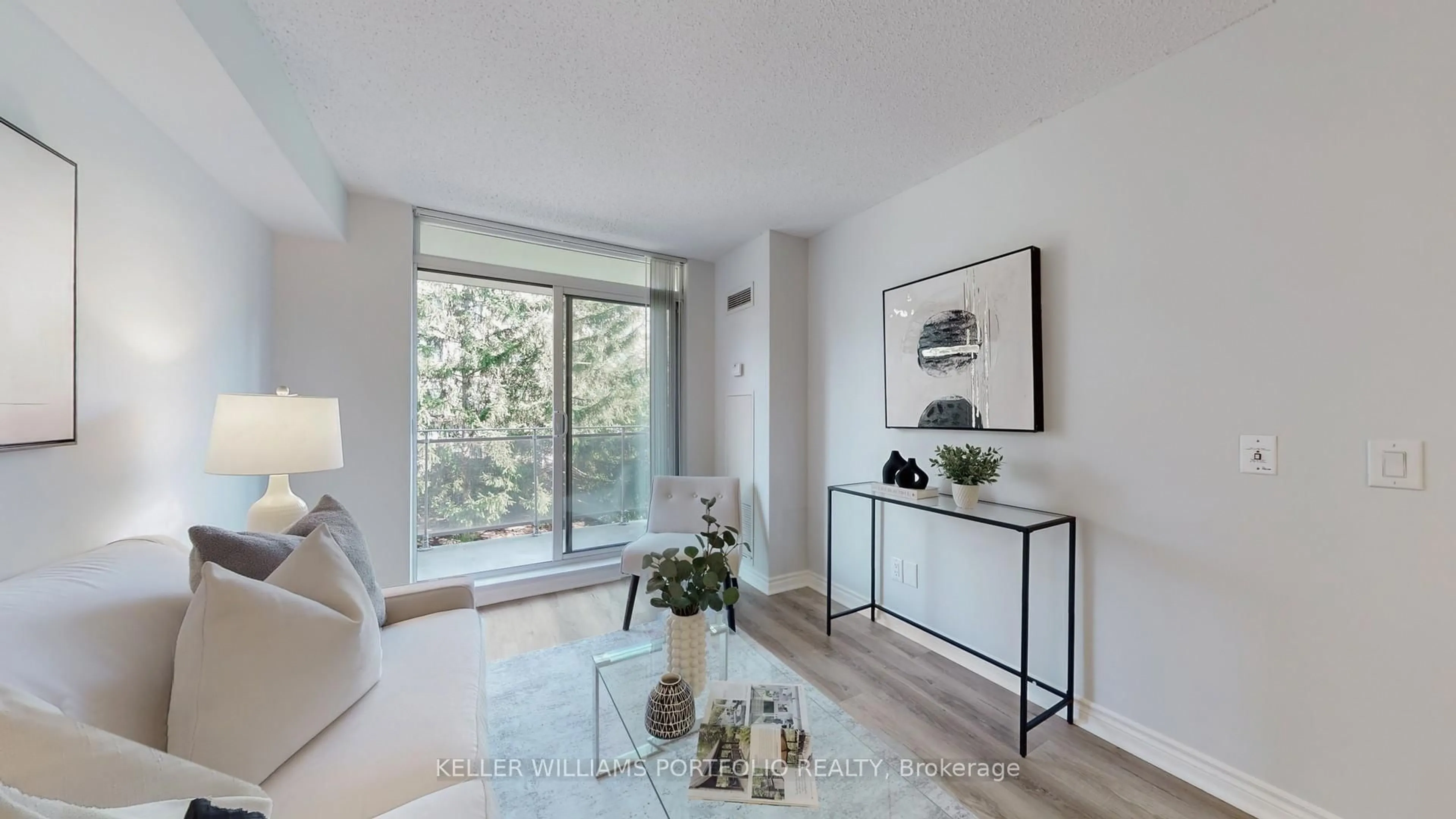 Living room with furniture, wood/laminate floor for 1730 Eglinton Ave #206, Toronto Ontario M4A 2X9