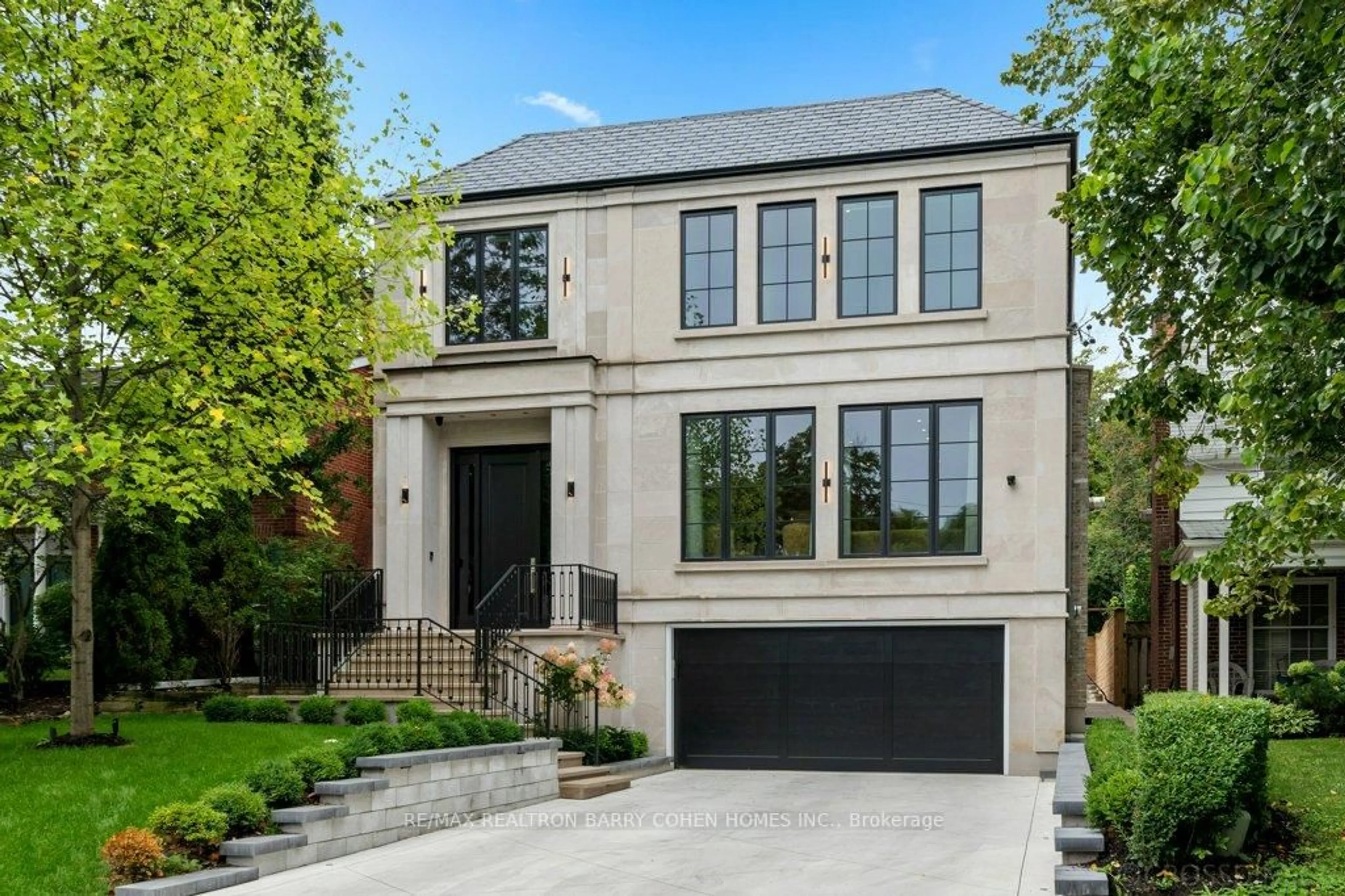 Home with brick exterior material, street for 50 Daneswood Rd, Toronto Ontario M4N 3J9