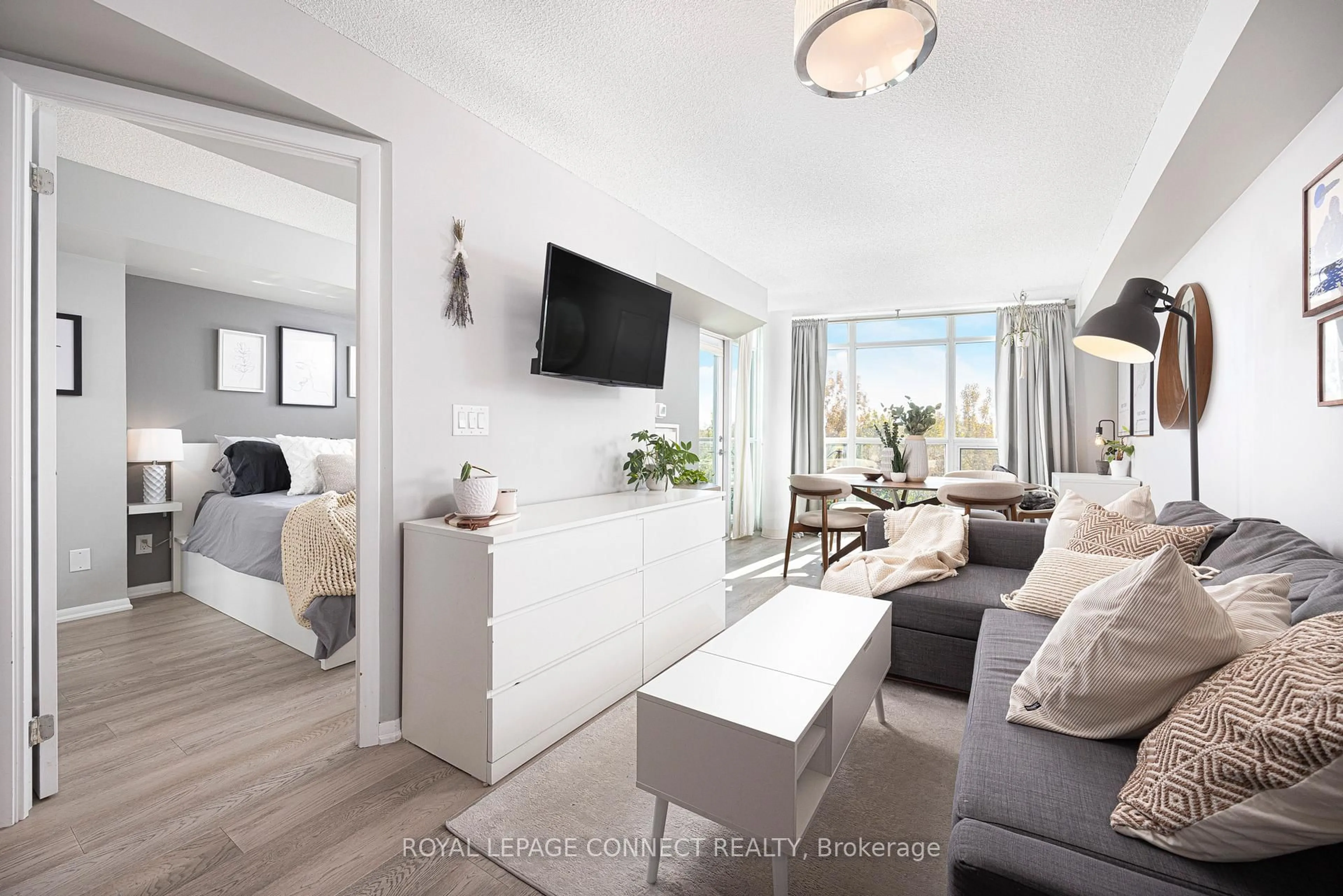 Living room with furniture, wood/laminate floor for 231 Fort York Blvd #609, Toronto Ontario M5V 1B2