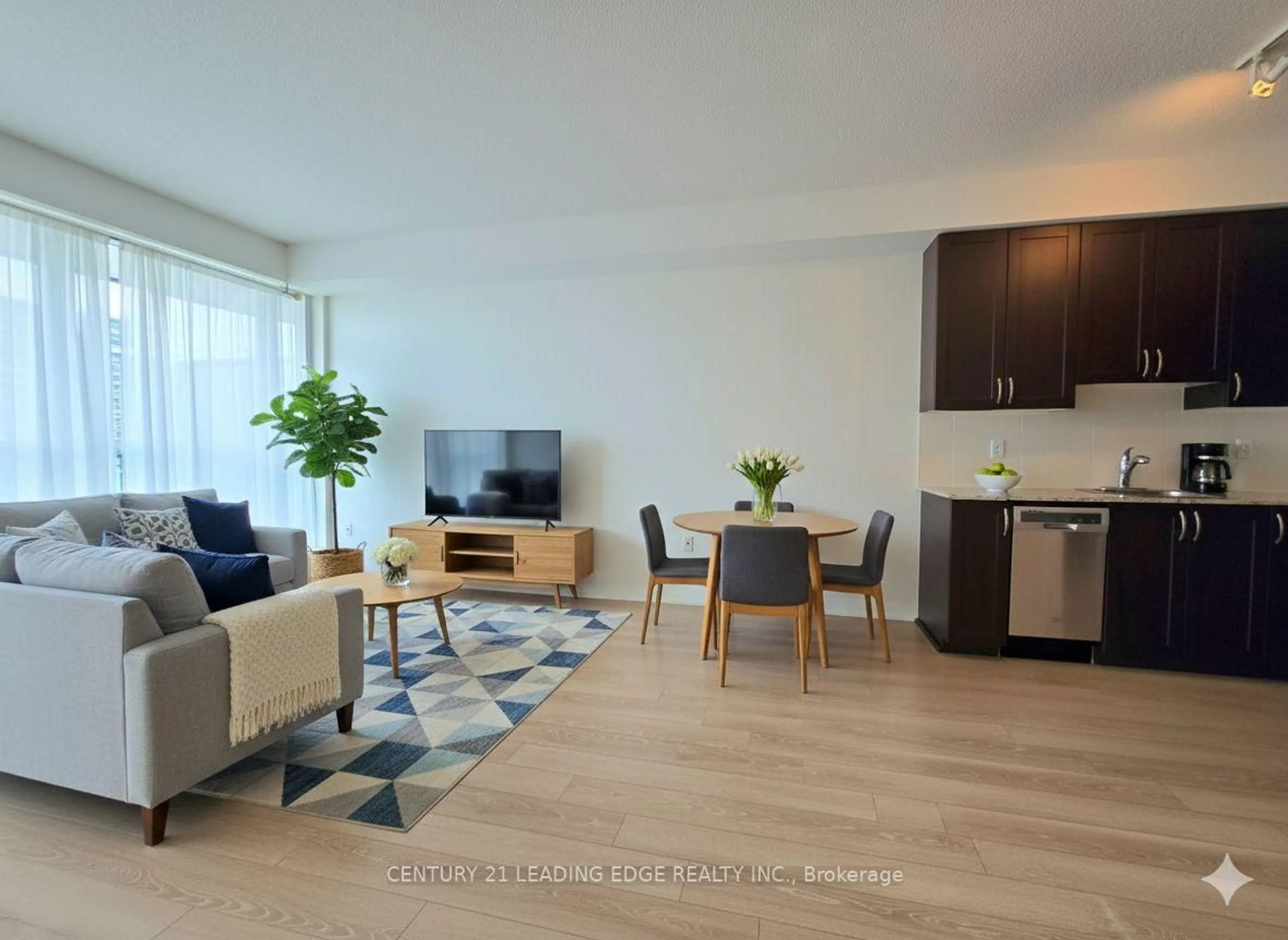 Living room with furniture, wood/laminate floor for 55 Ann O'Reilly Rd #3109, Toronto Ontario M2J 0C9