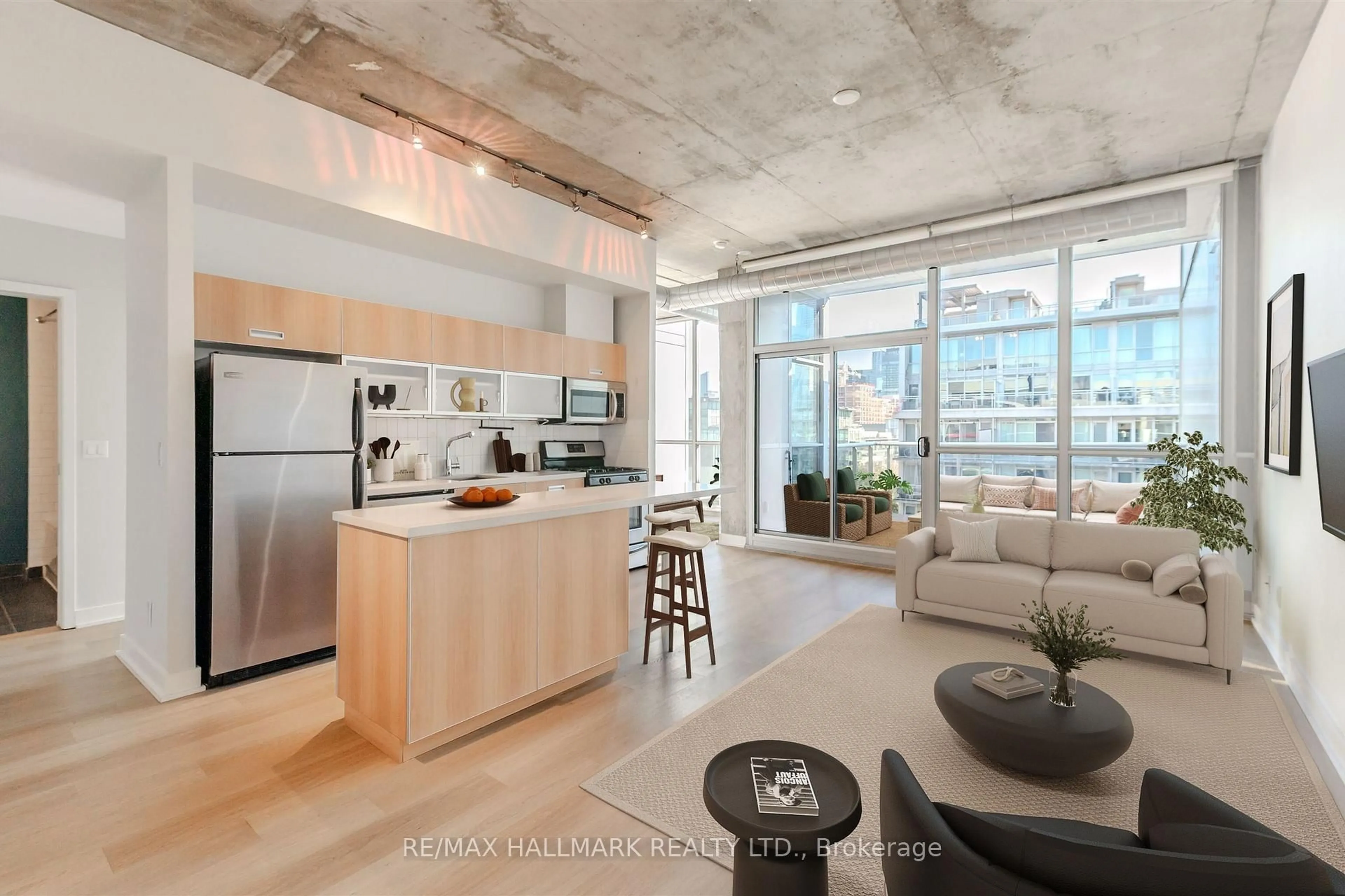 Open concept kitchen, cement floor for 60 Bathurst St #910, Toronto Ontario M5V 2P4