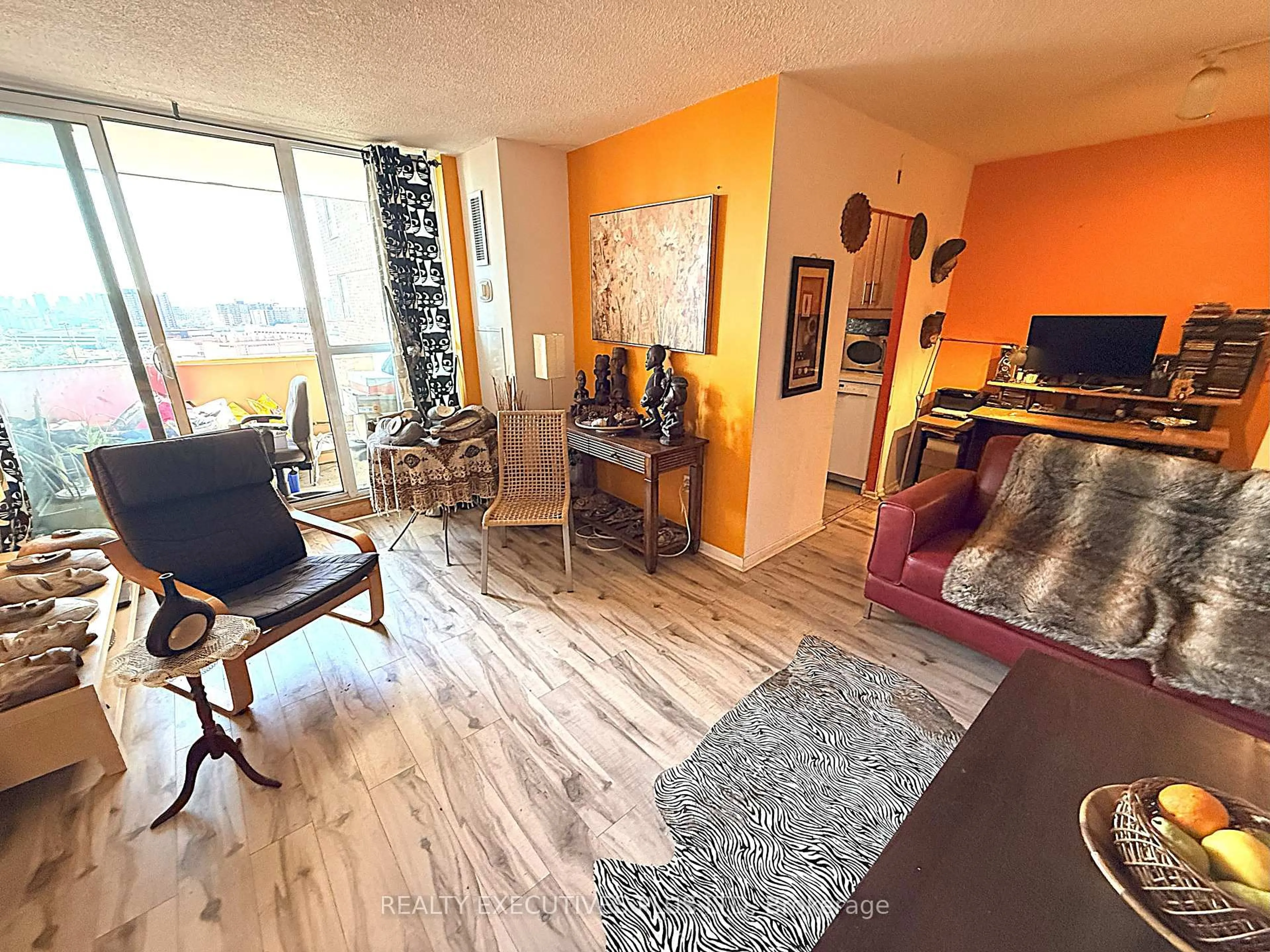 Living room with furniture, wood/laminate floor for 5 Old Sheppard Ave #1610, Toronto Ontario M2J 4K3