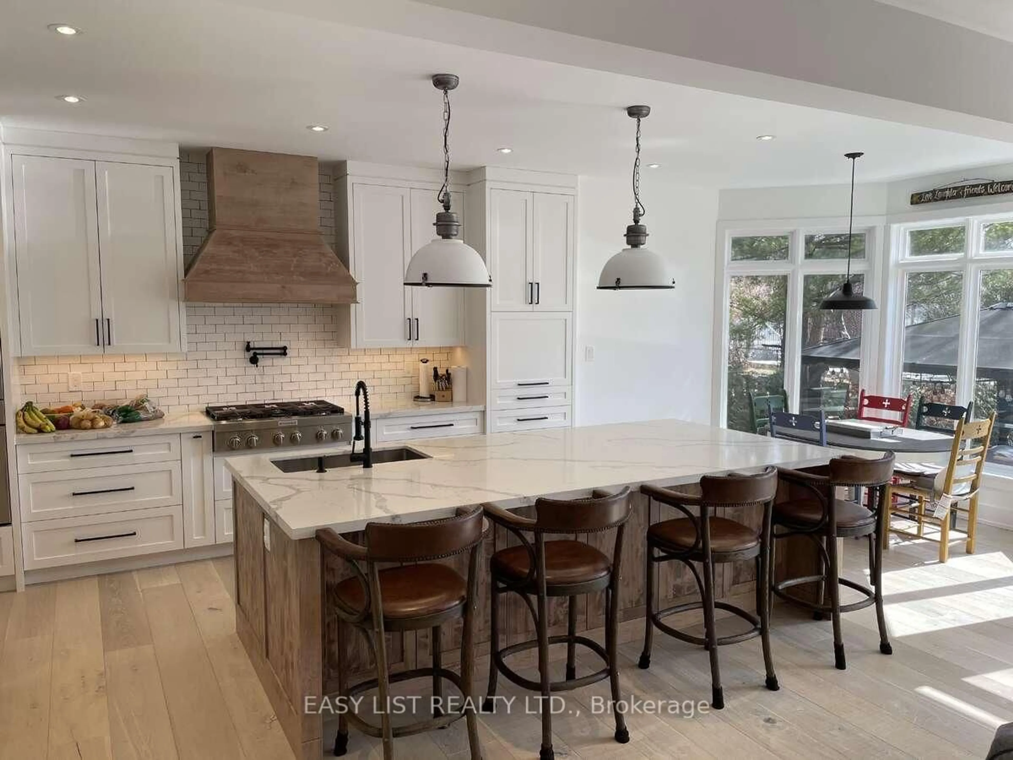 Open concept kitchen, ceramic/tile floor for 39 Romney Rd, Toronto Ontario M3H 1H4