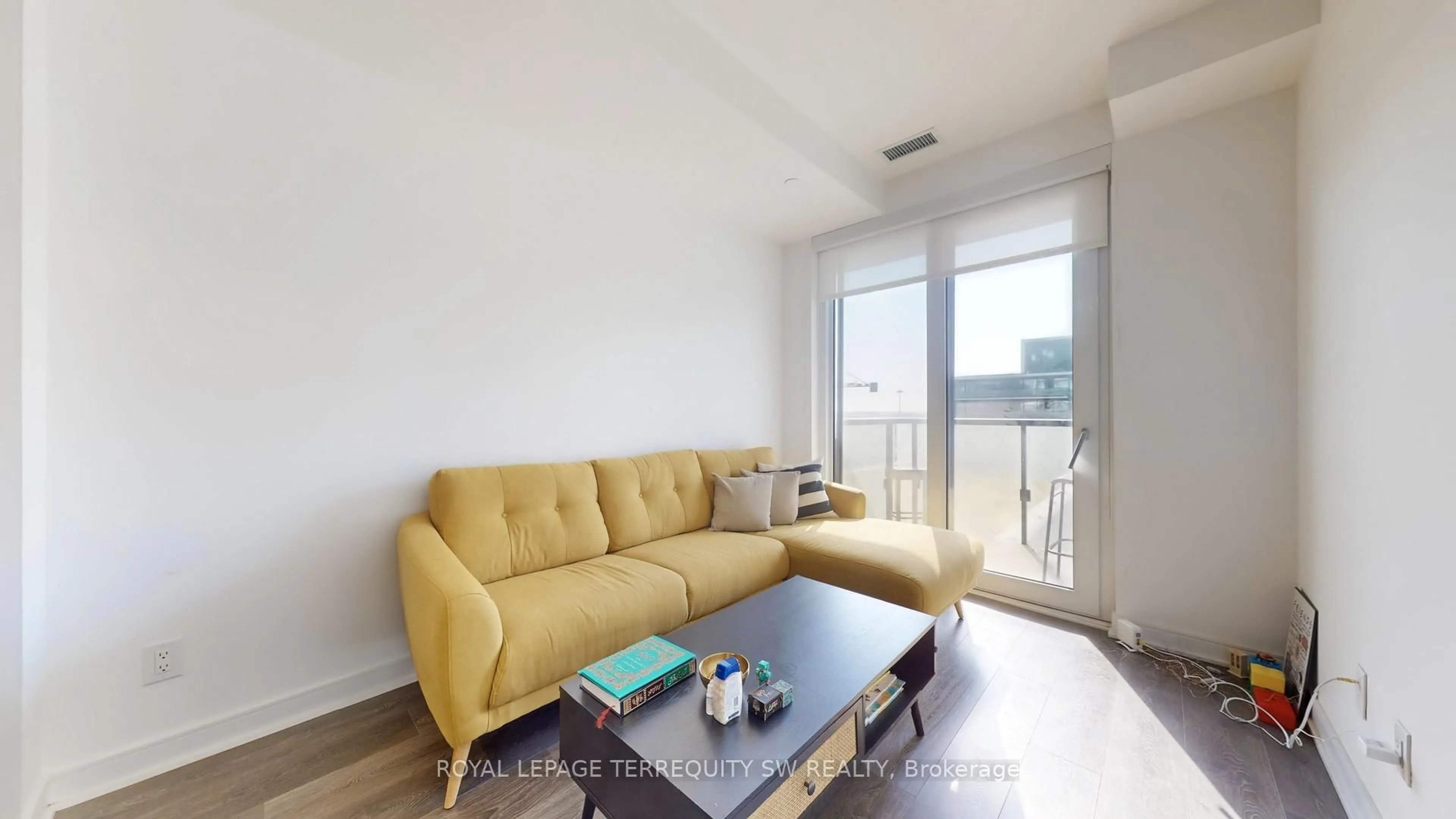 Living room with furniture, wood/laminate floor for 35 Rolling Mills Rd #15, Toronto Ontario M5A 0V6