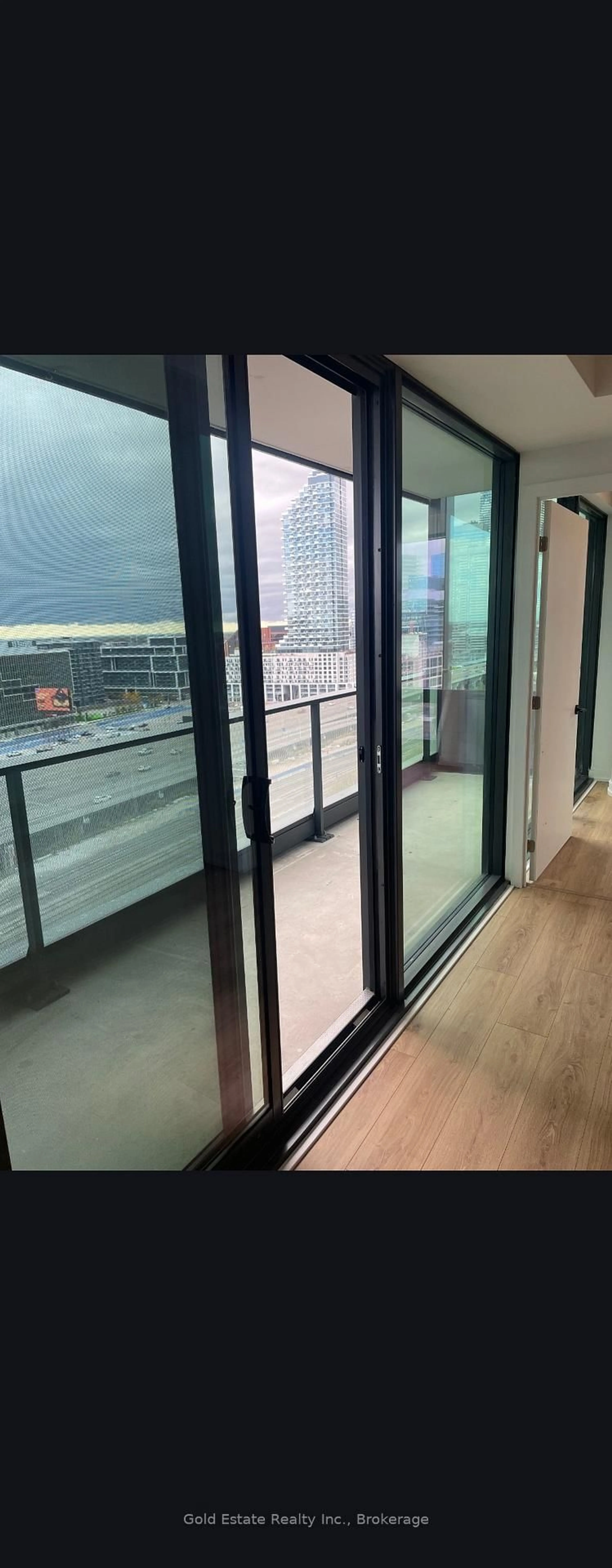 Balcony in the apartment, city buildings view from balcony for 33 Parliament St #1604, Toronto Ontario M5A 2Y2