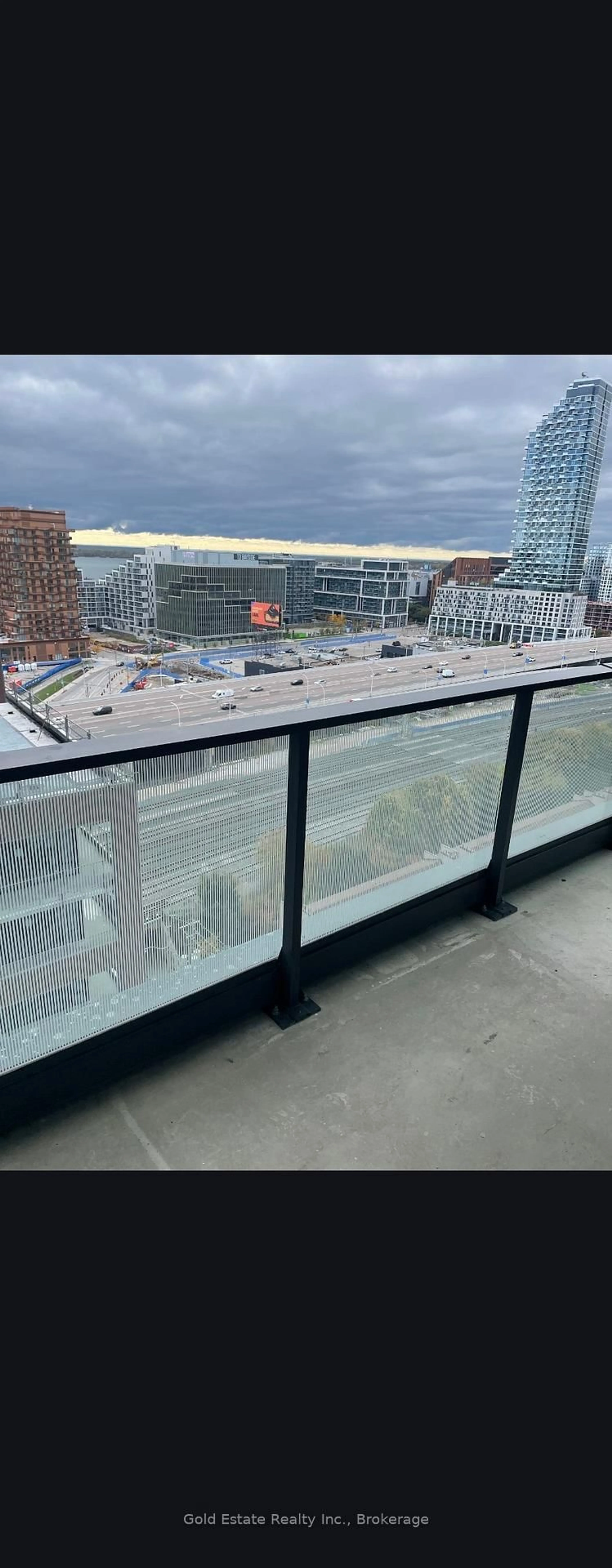 Balcony in the apartment, city buildings view from balcony for 33 Parliament St #1604, Toronto Ontario M5A 2Y2