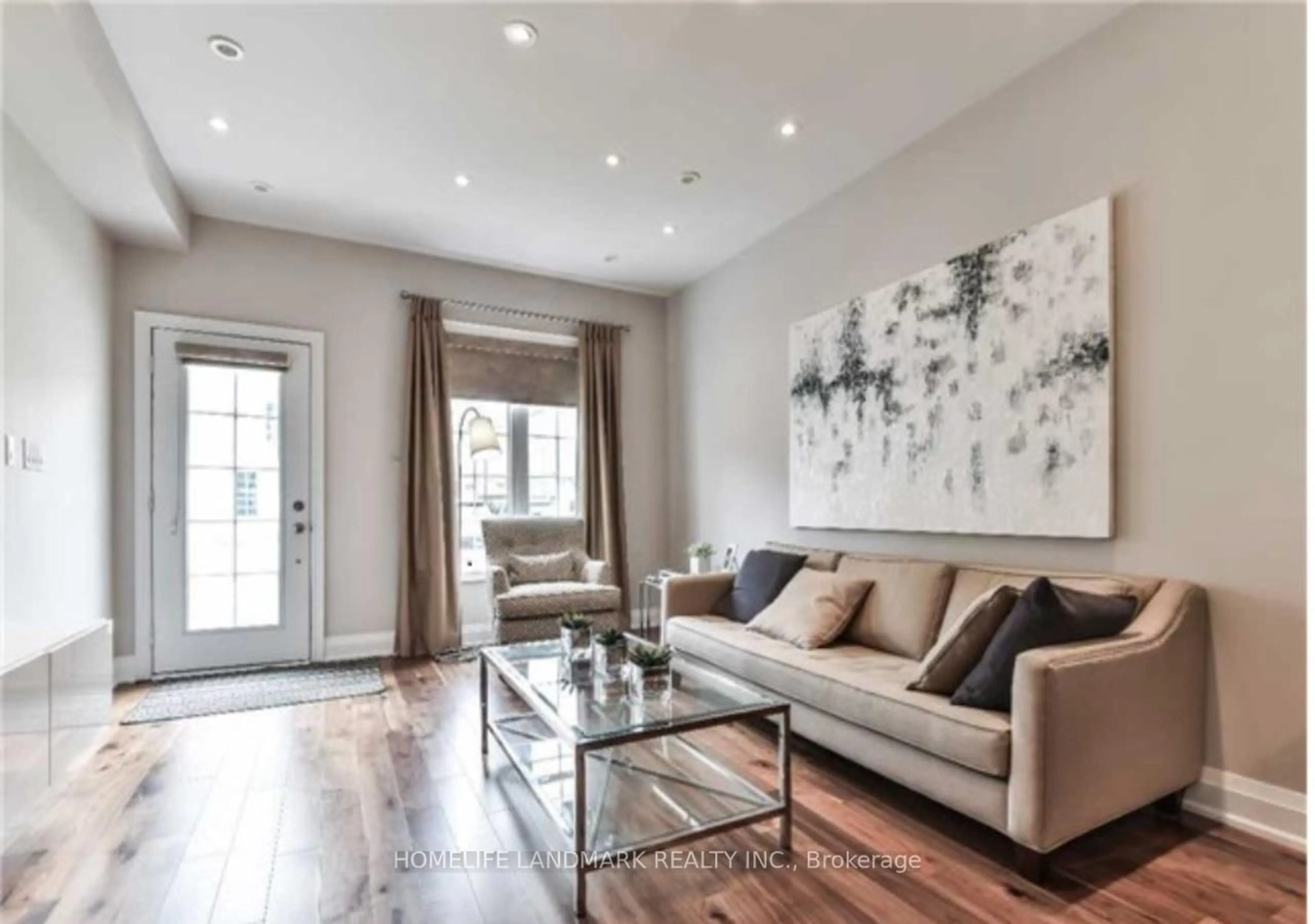 Living room with furniture, wood/laminate floor for 65 Hargrave Lane, Toronto Ontario M4N 0A4