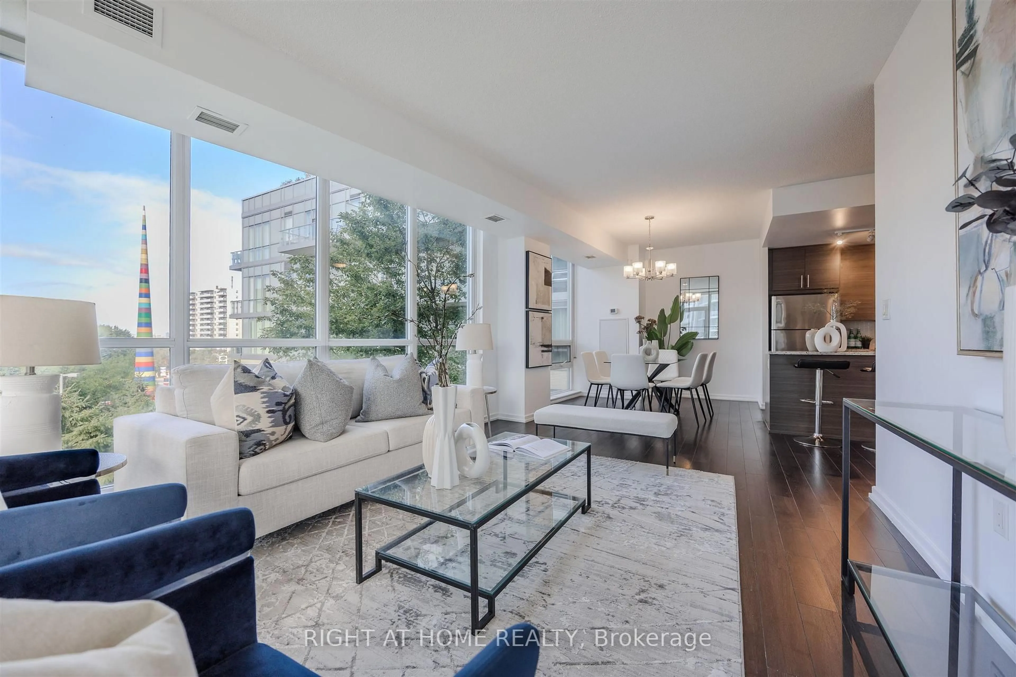 Living room with furniture, unknown for 70 Forest Manor Rd #206, Toronto Ontario M2J 0A9