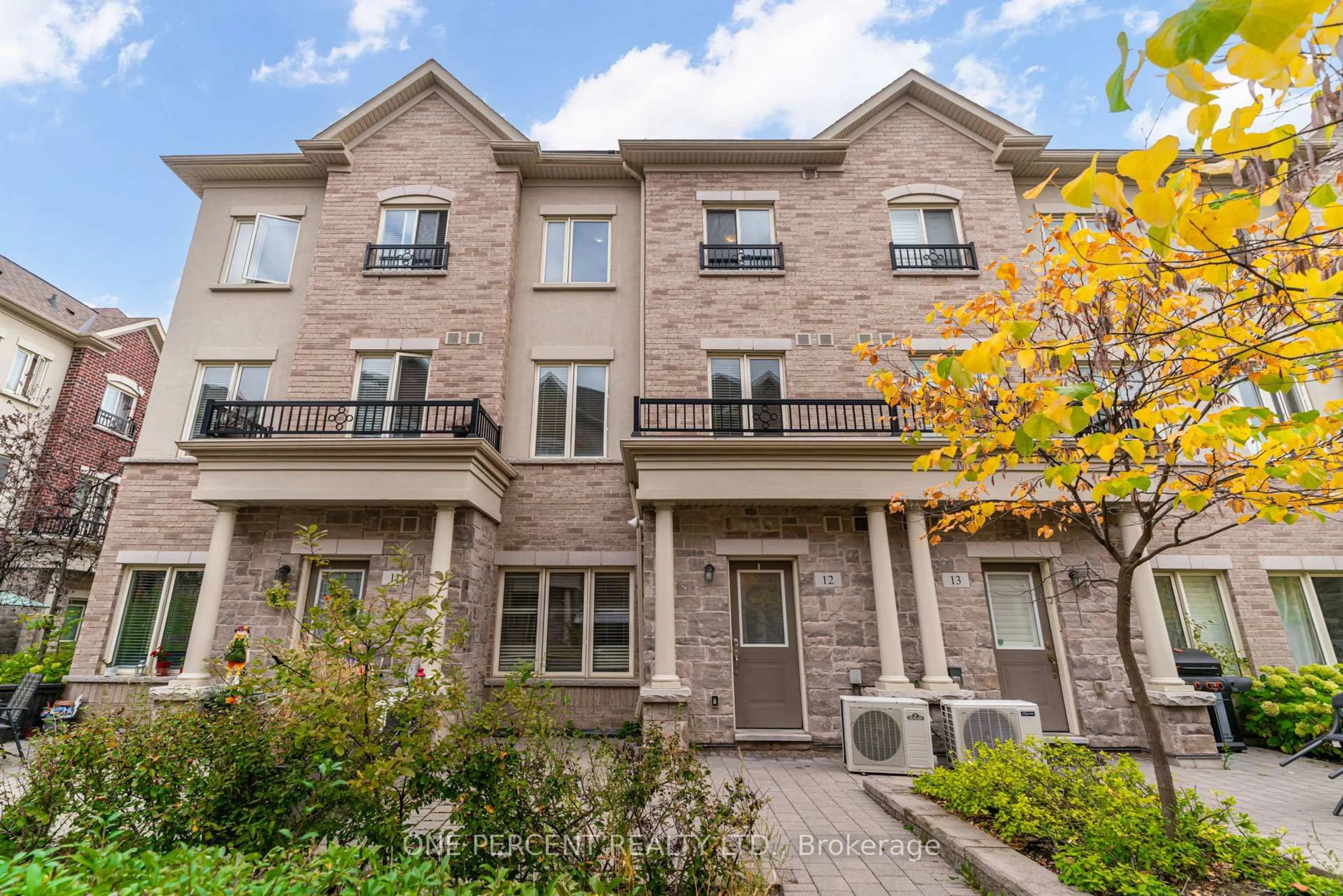 Home with brick exterior material, street for 25 Coneflower Cres #12, Toronto Ontario M2R 0A5