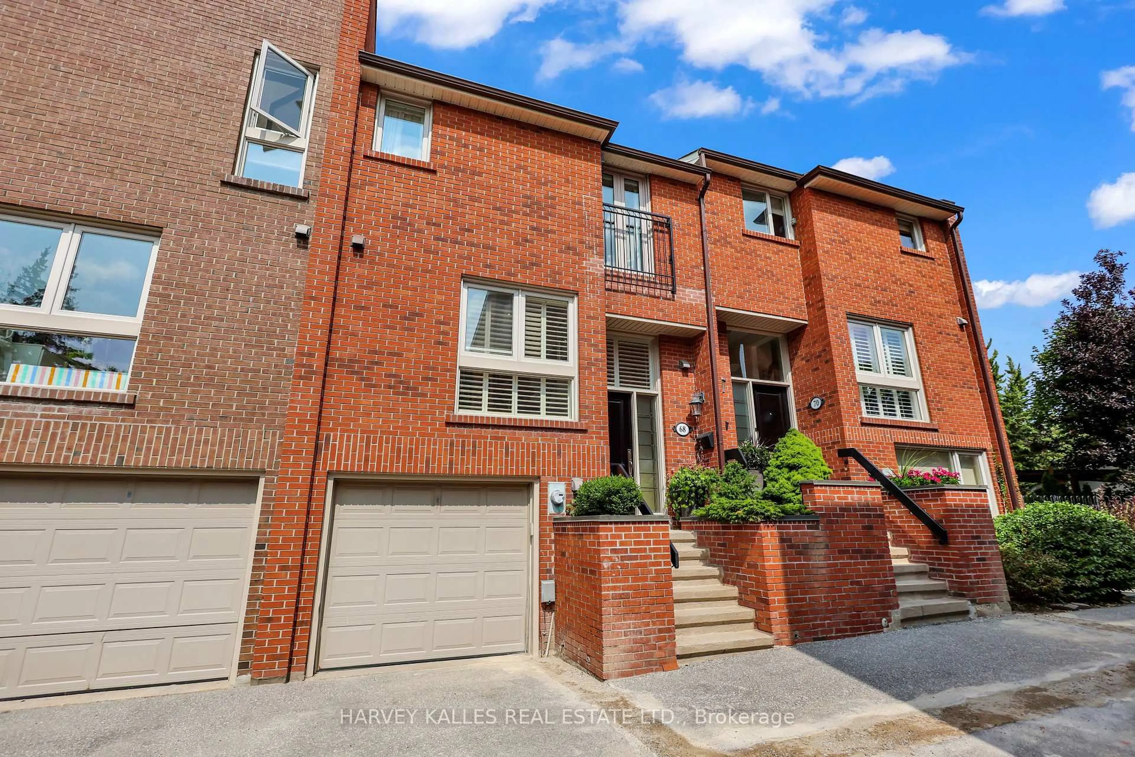 Home with brick exterior material, street for 68 Sylvan Valleyway, Toronto Ontario M5M 4M3